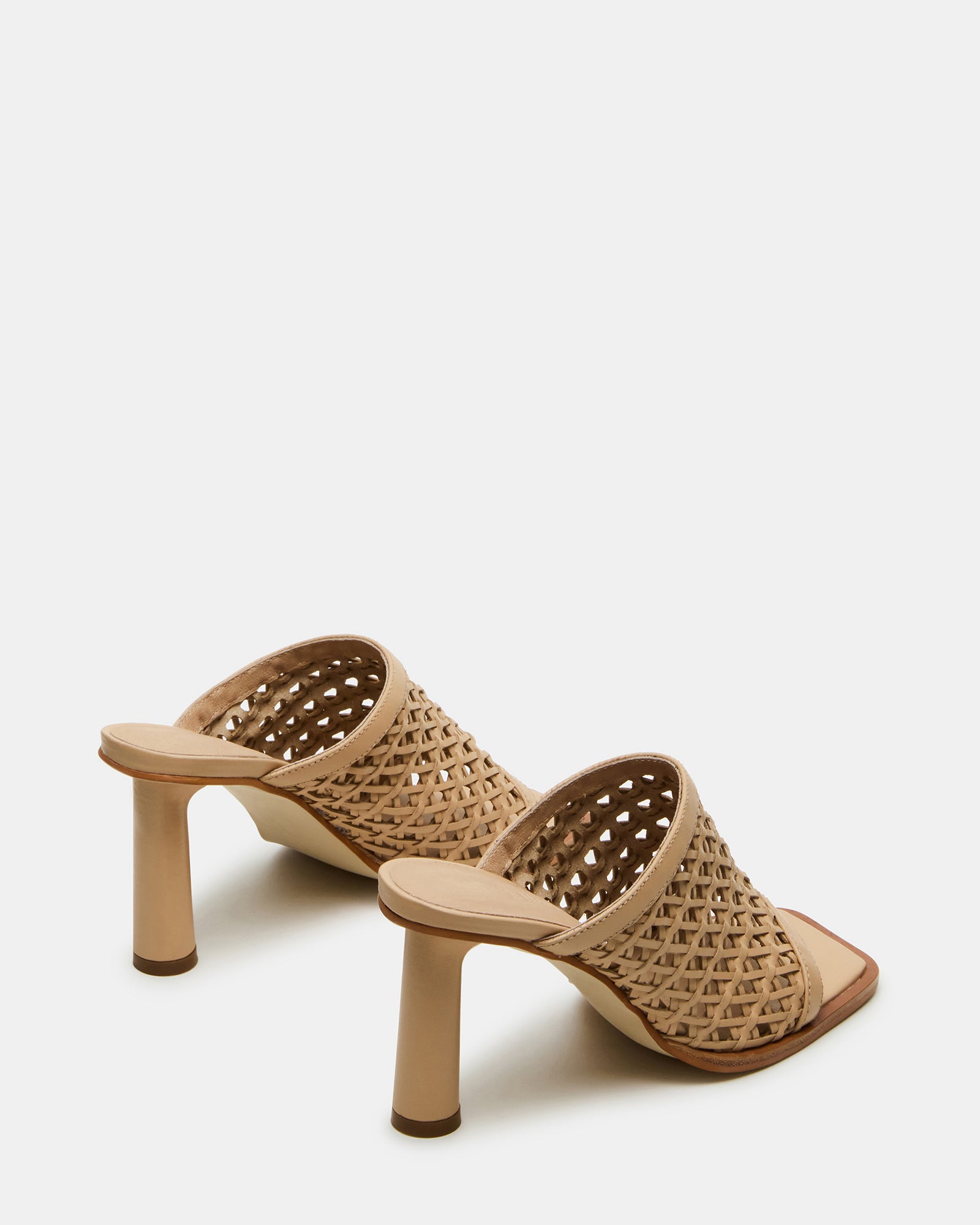 Close-up of square toe mules heels with stitching detail and matte finish