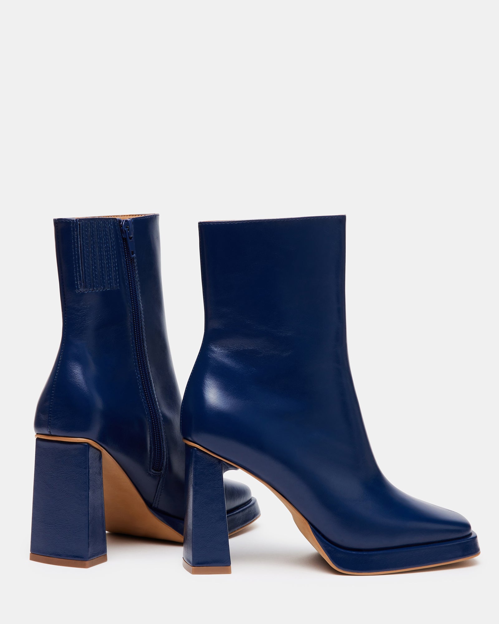 Freya navy square toe booties showcasing a side angle view.