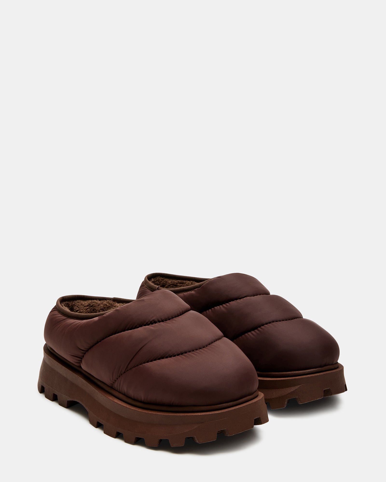 Side view of mens slip-on shoes highlighting the puffy platform design