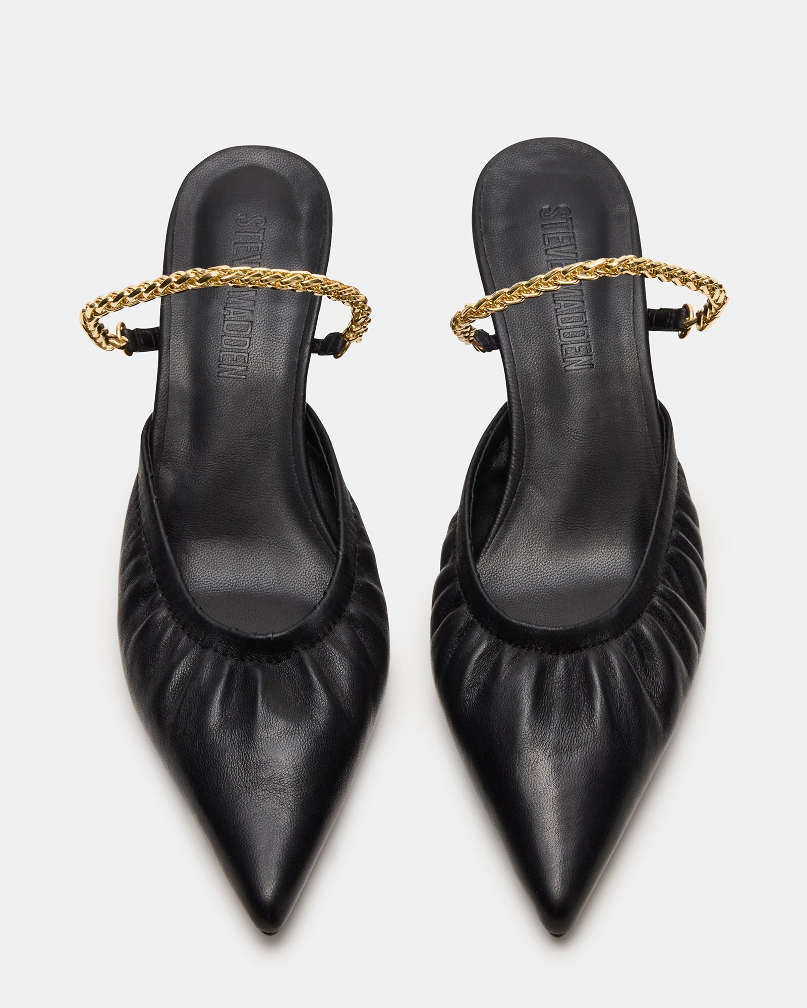 Side view of Gala Luxe pointed-toe black mule heels showcasing the chic chain strap.