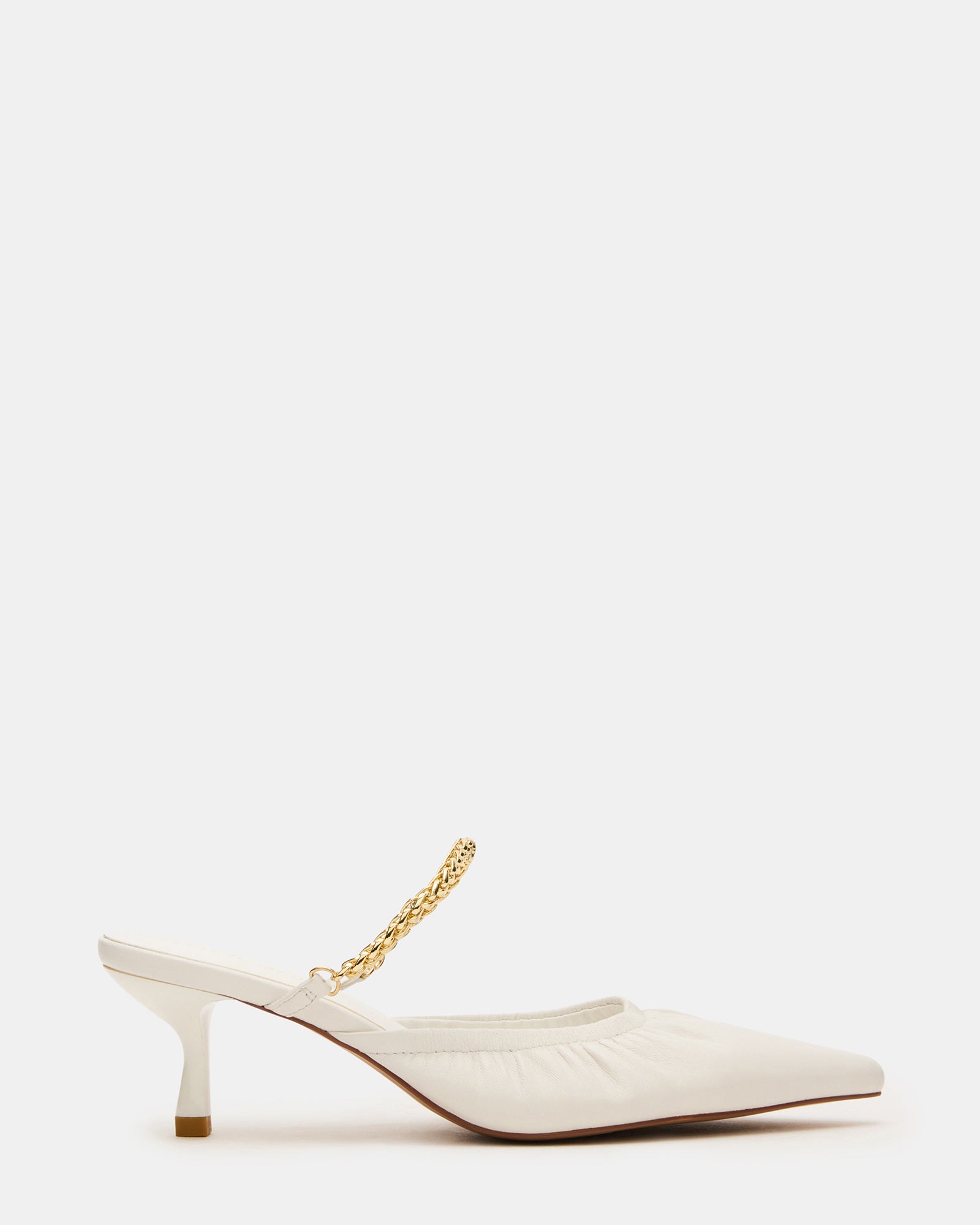 Black leather pointed toe mule heels styled with cropped jeans
