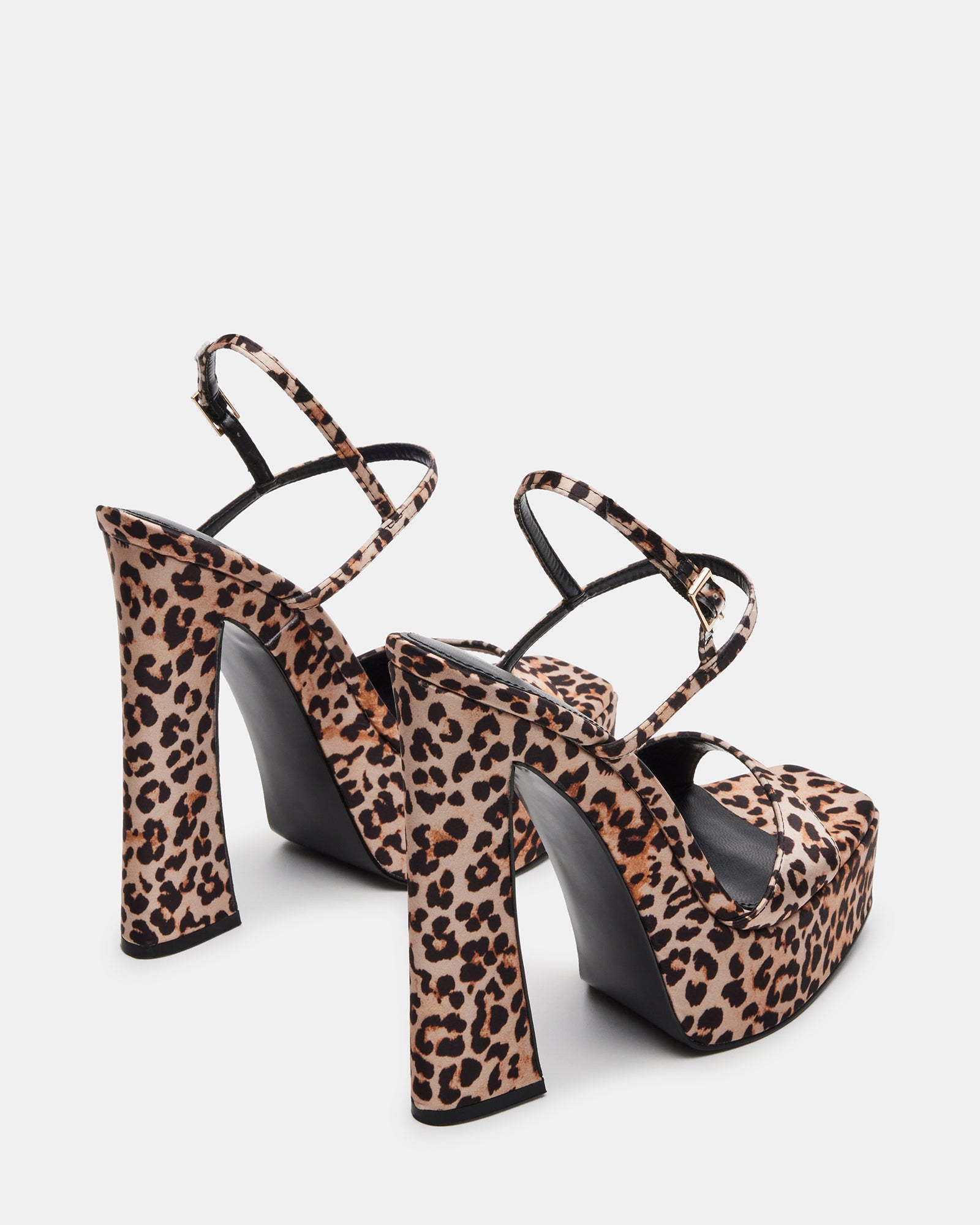 Detail shot of sandals high heels silver with textured leopard finish