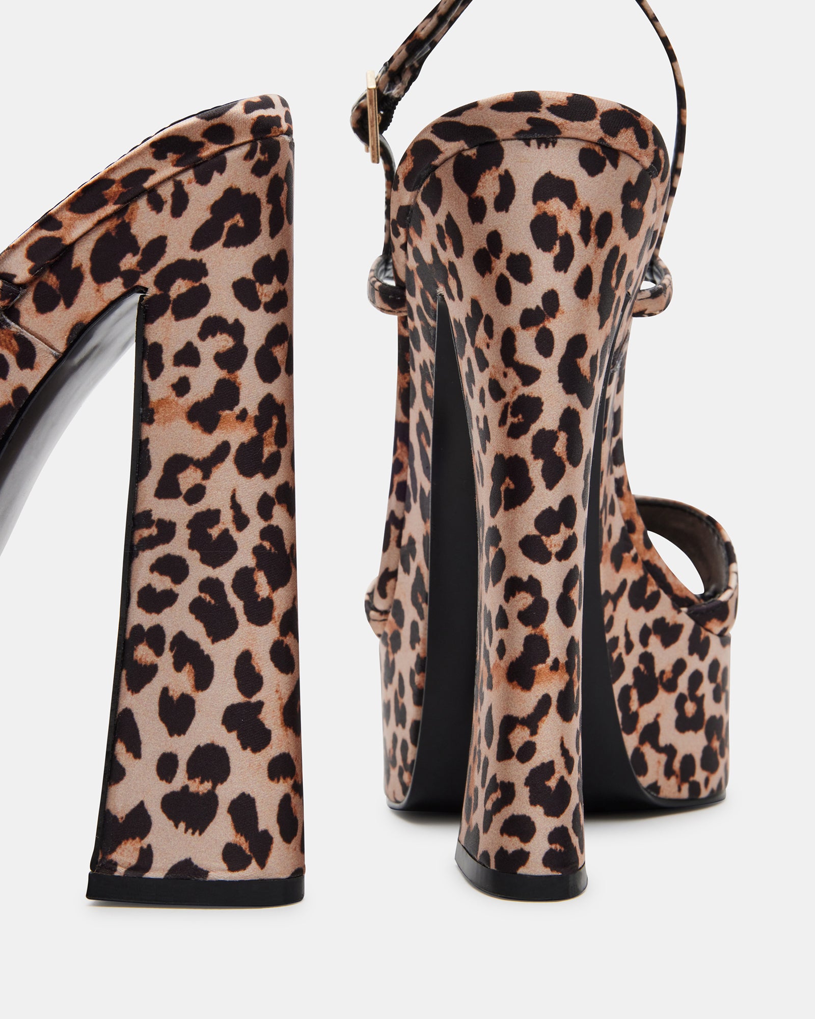 Close-up of leopard satin block heel shoes with open toe design