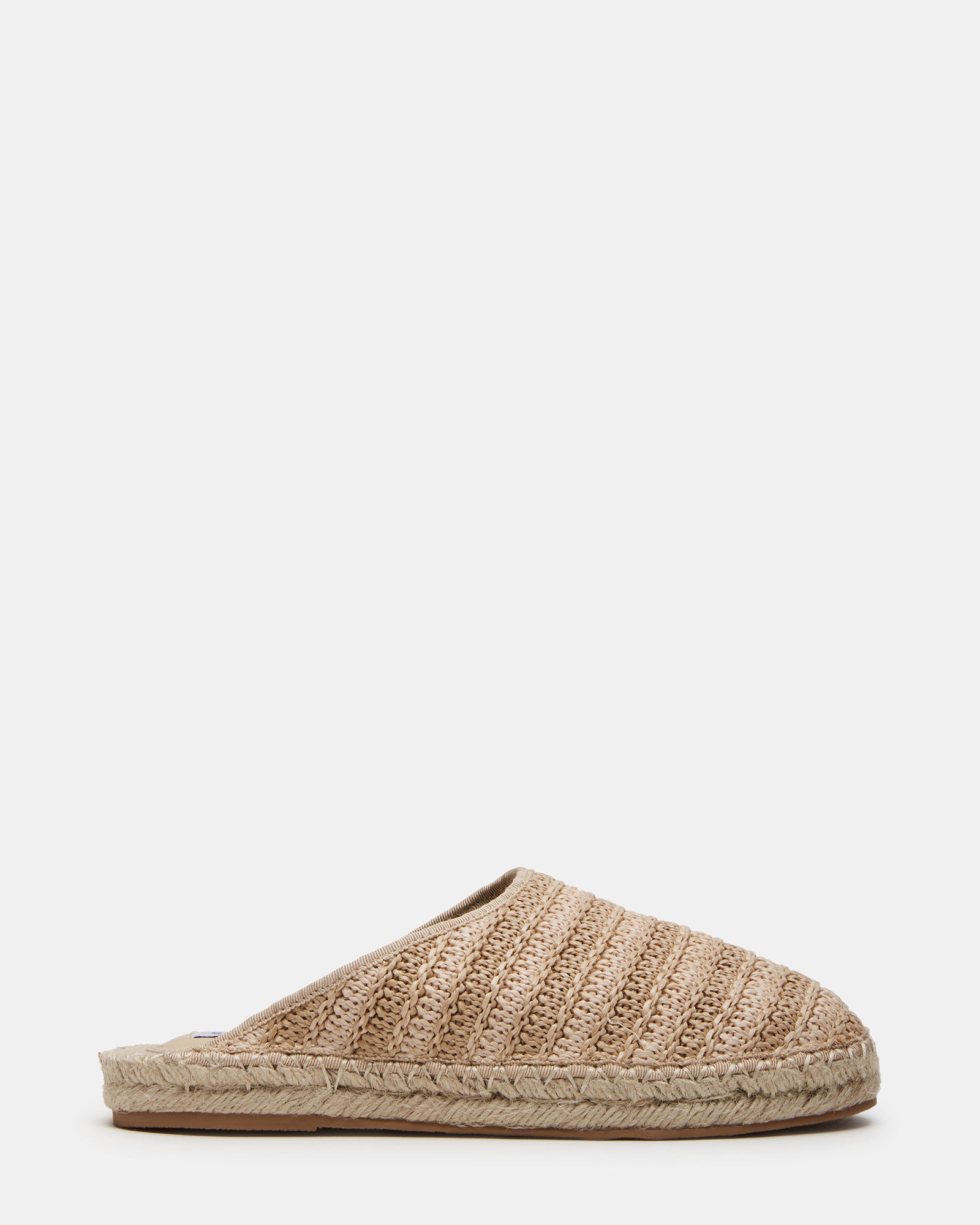 Top view of raffia mules showcasing breathable texture and rounded toe detail