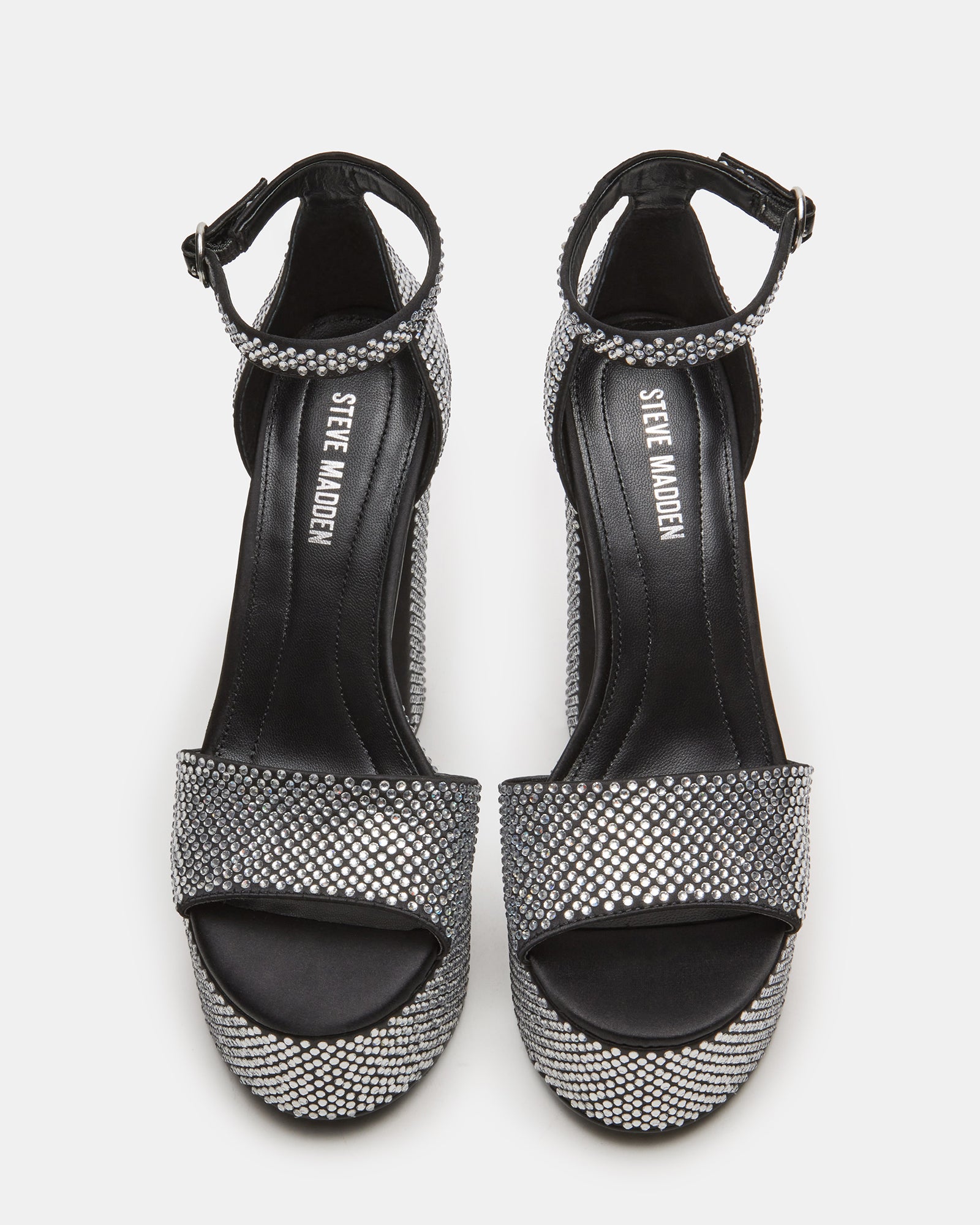 Chic black rhinestone heels with ankle strap and open toe.