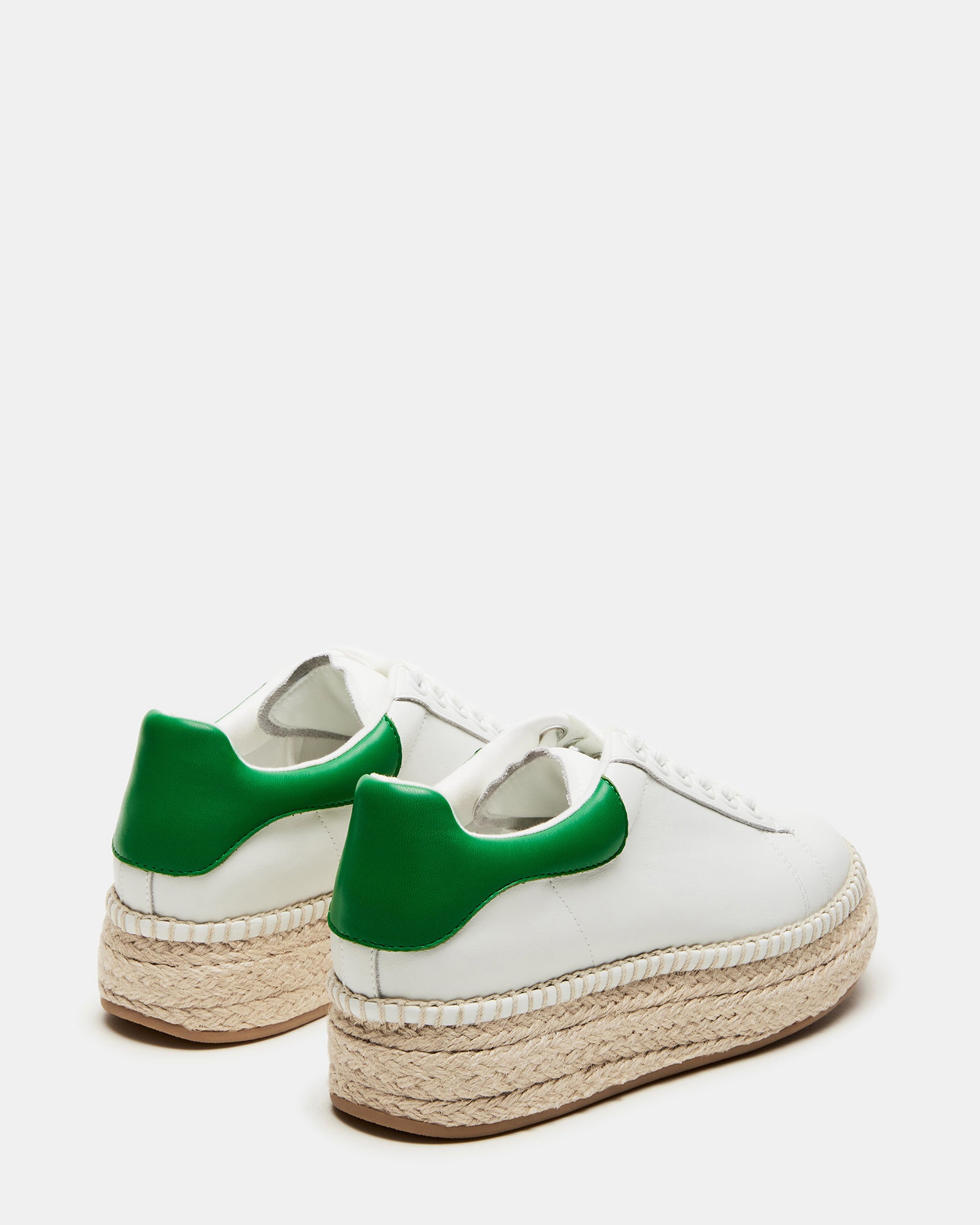 Close-up of the espadrille bottom of GLANCE sneakers.