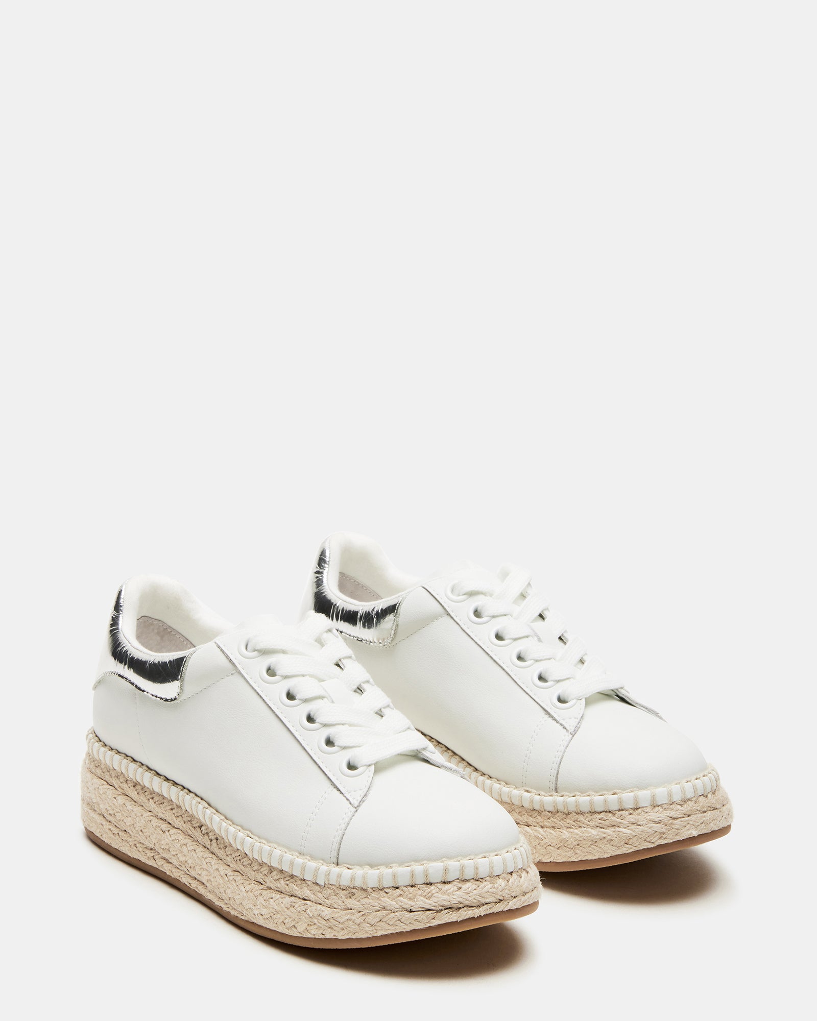 Close-up of the lace-up detail on GLANCE leather sneakers with playful metallic accents