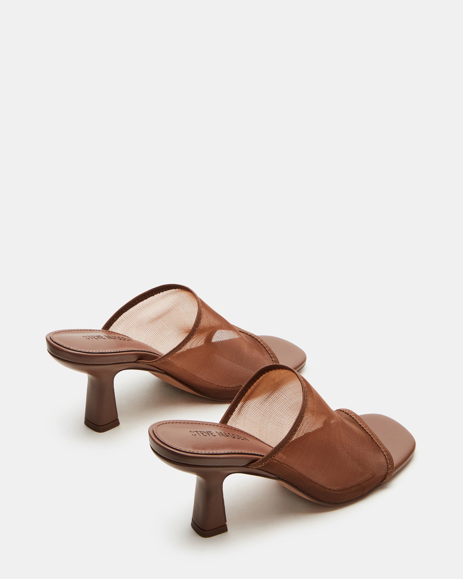 Side profile of mesh high heels highlighting 3-inch heel height