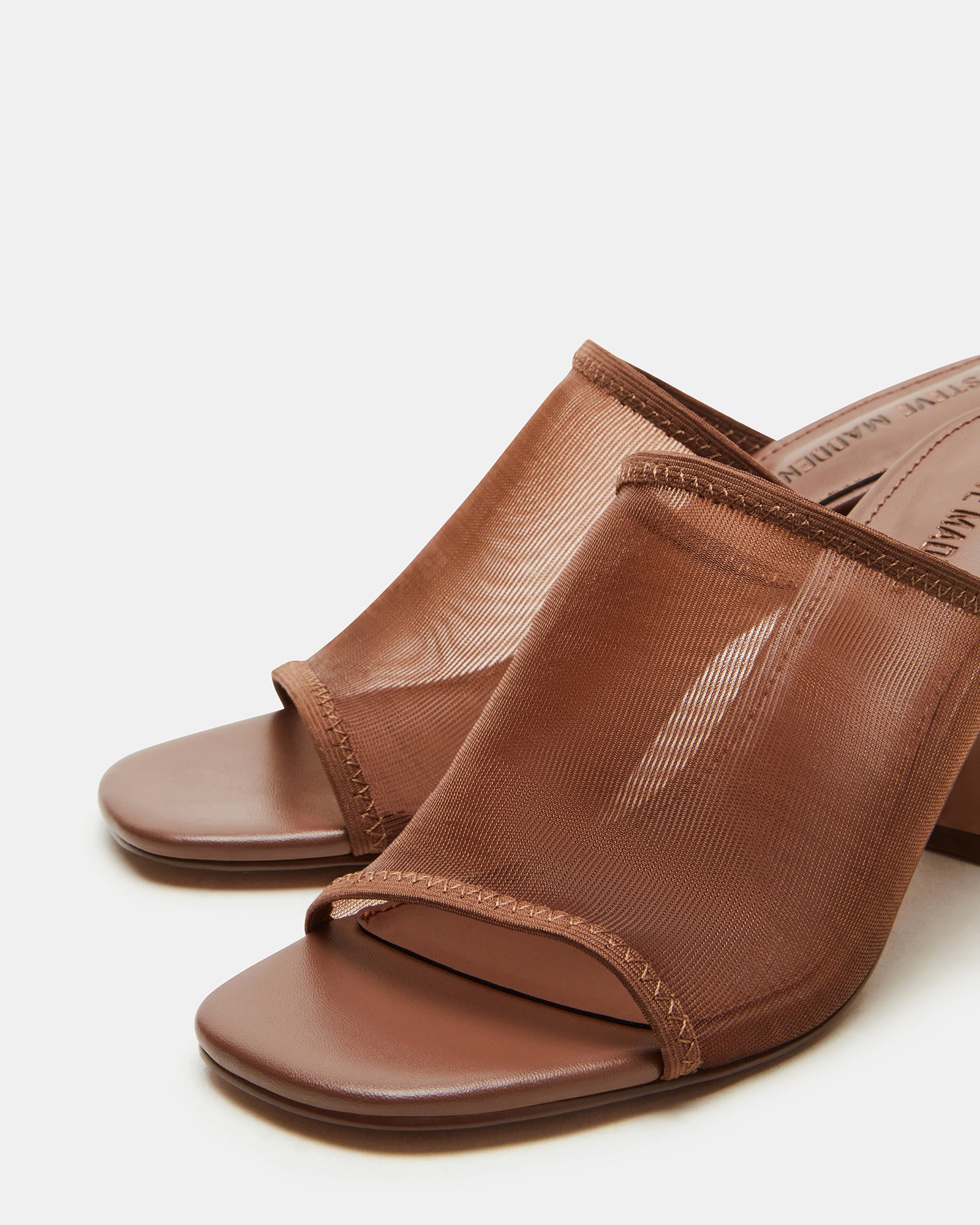 Gleam mesh heel shoes styled with cropped denim for a casual-chic look