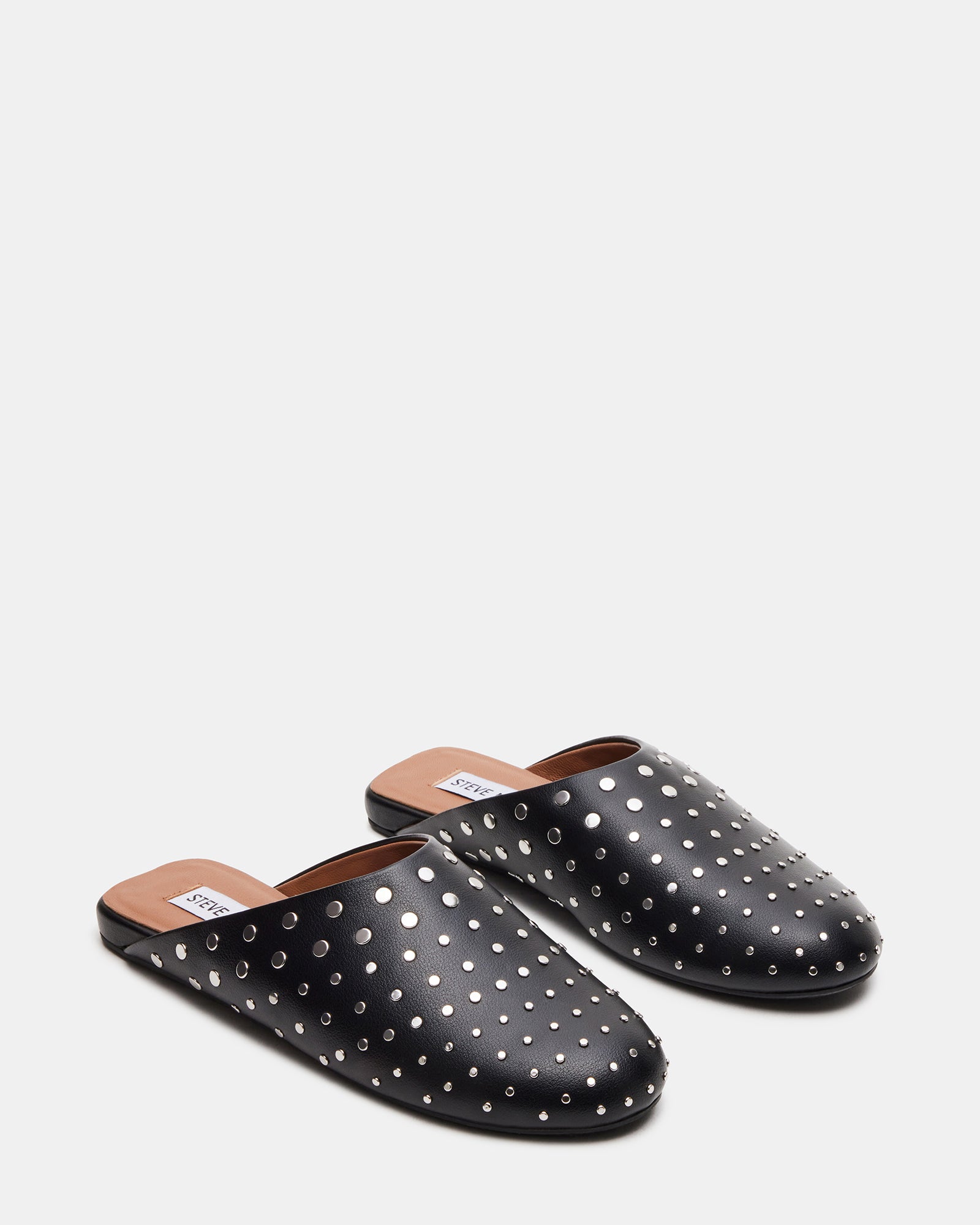 Front view of ladies mules flat, showing slip-on design and sleek silhouette.
