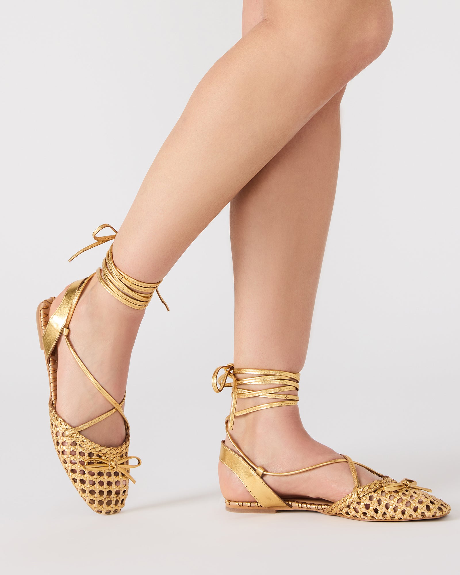 Closeup angle of mesh ballet flats with delicate stitching detail