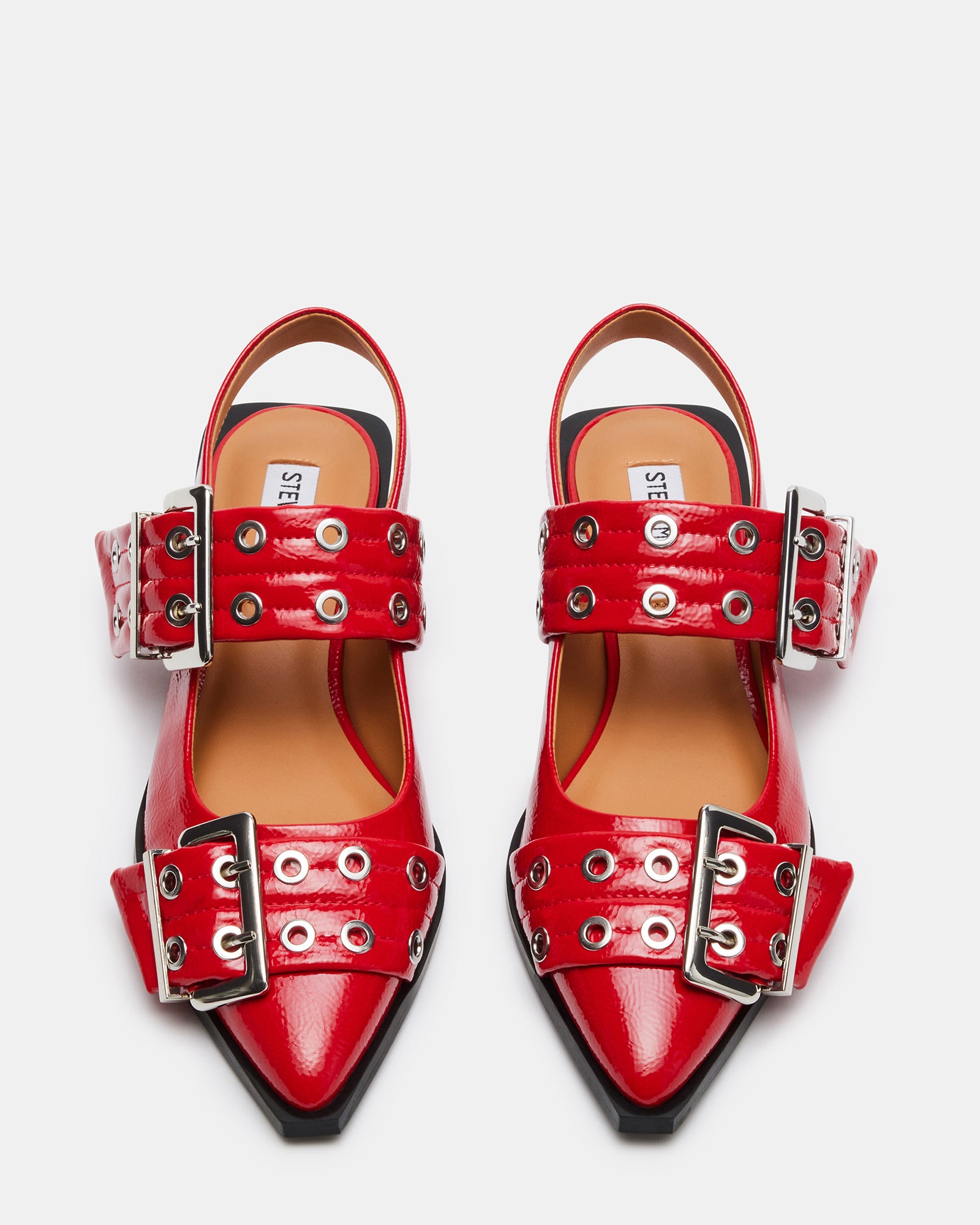 Close-up of snipped pointed toe and buckle detailing on these slingback flats.