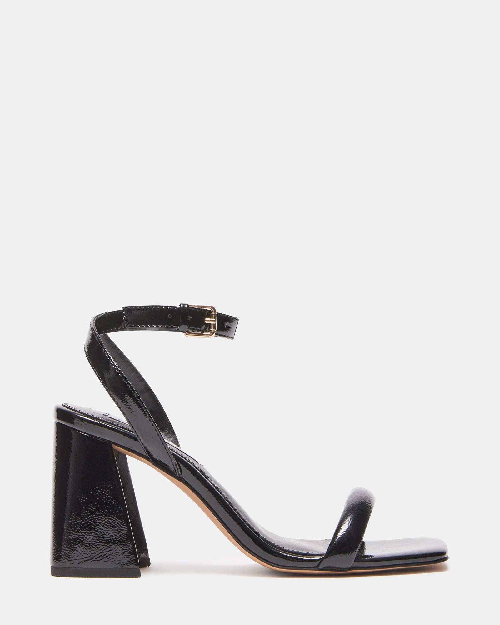 Gretin black platform heels styled with tailored pants for office wear