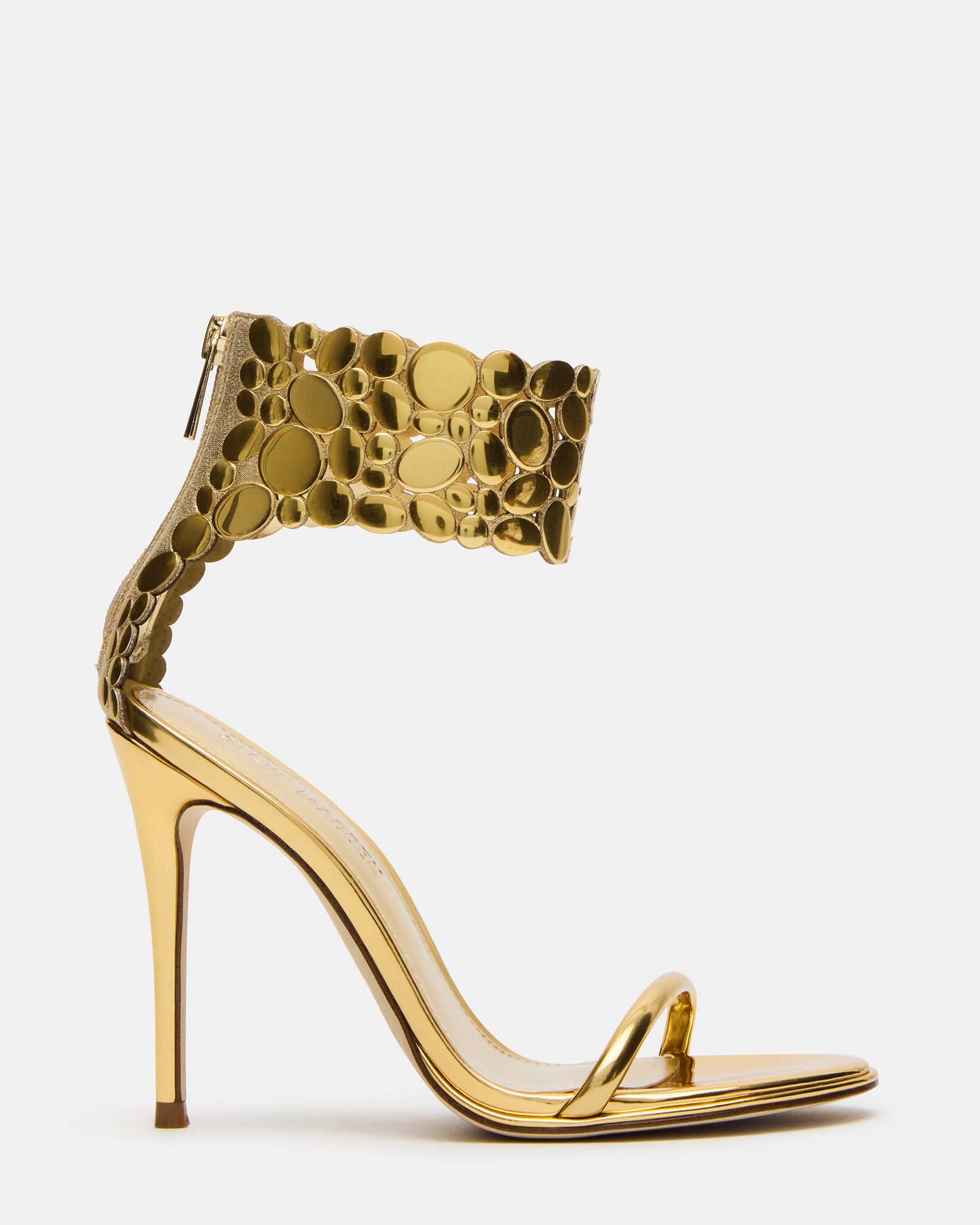 Side view of Groovi Gold high heel boots with silver finish