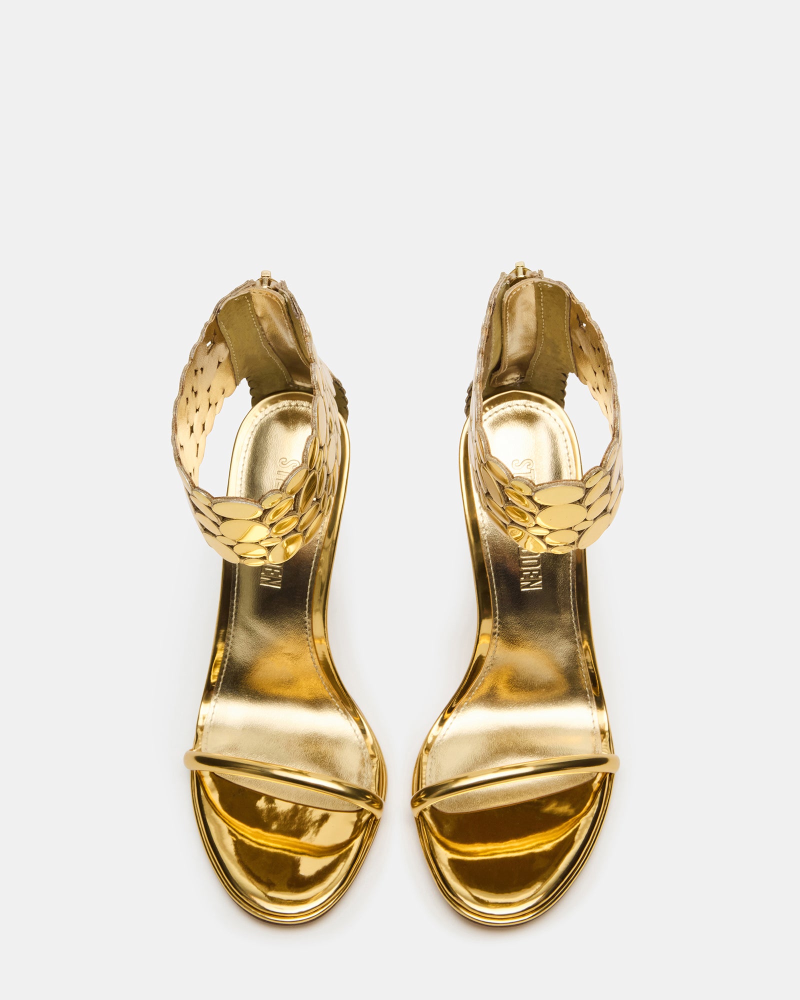 Side view of Groovi Gold high heel boots with silver finish