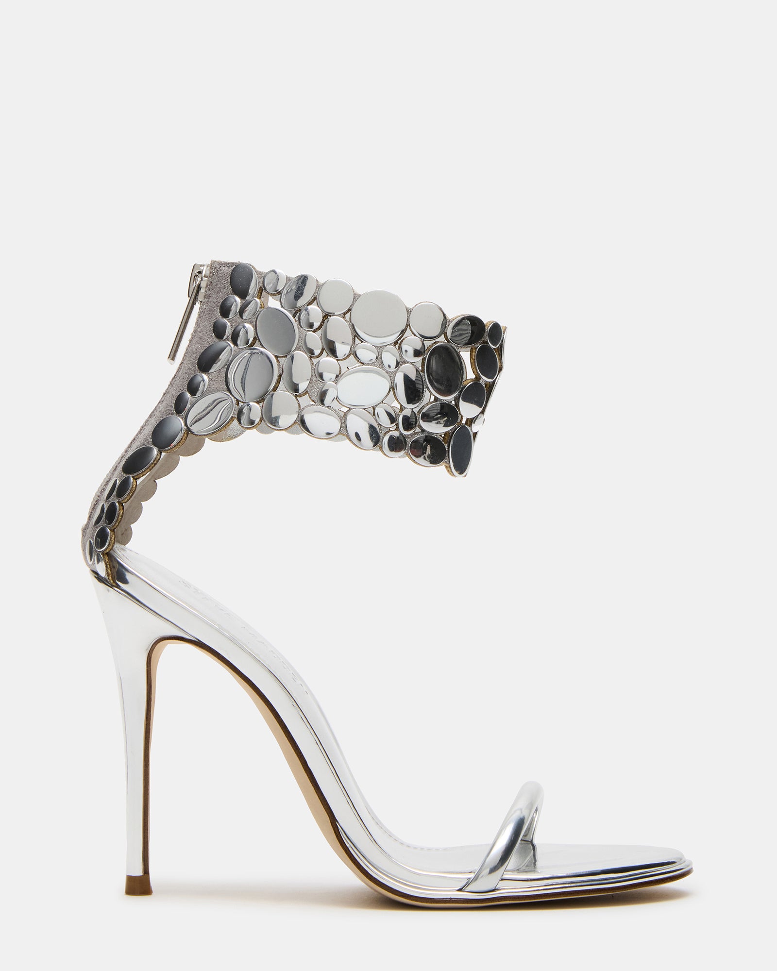 Silver GROOVI stiletto heels from the side, showcasing sleek design