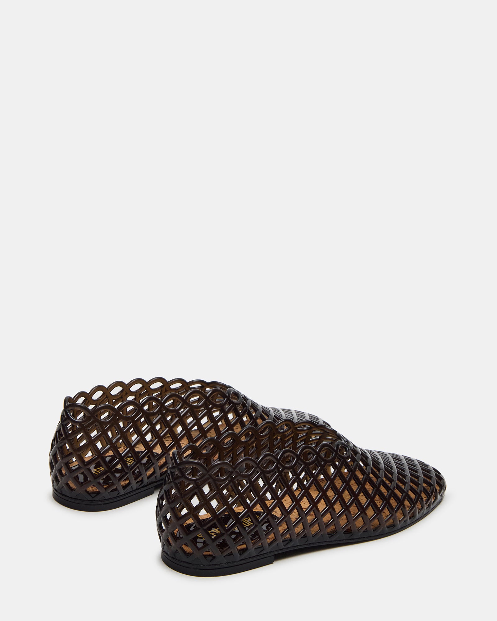 Close-up of synthetic upper material on stylish flat shoes for flat feet