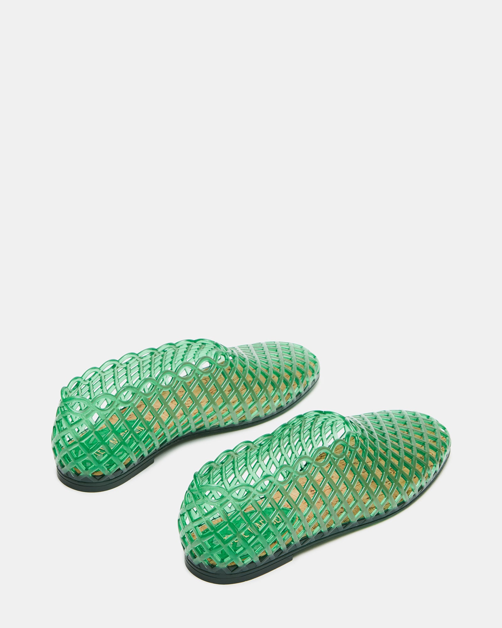 Grove Green sandals styled with summer attire for a casual look.