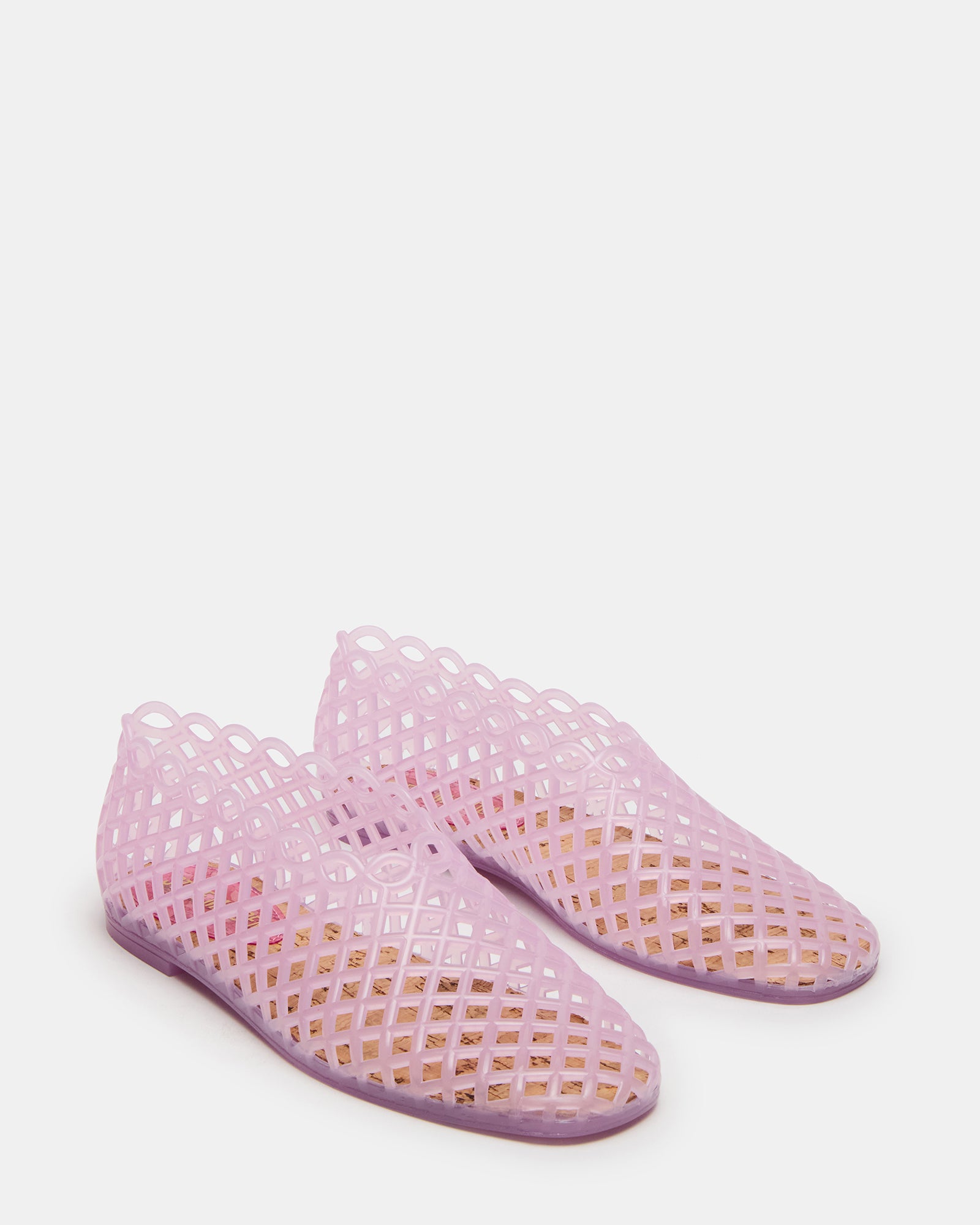 Overhead view of pink sandals showing jelly cage and flat heel