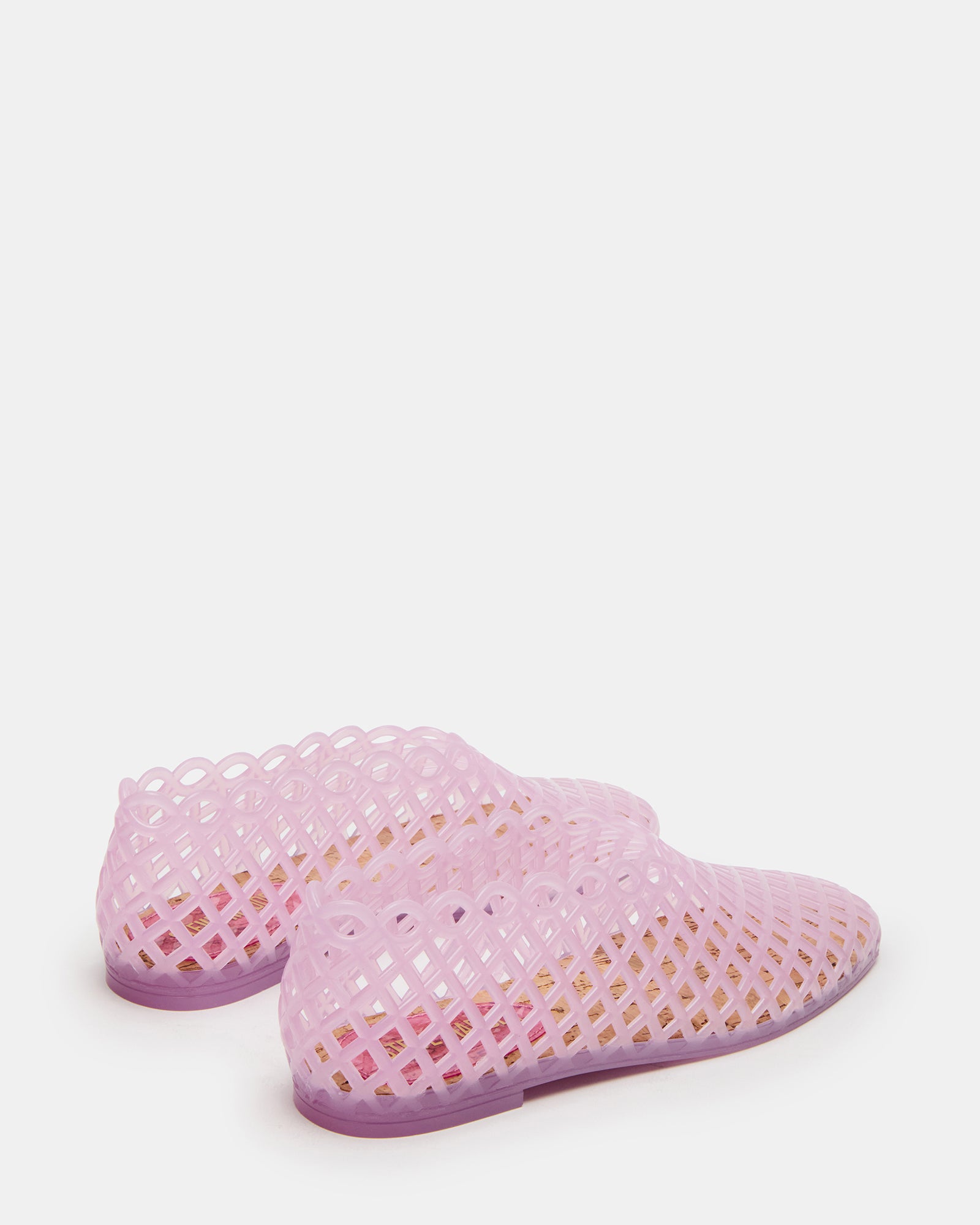 Overhead view of pink sandals showing jelly cage and flat heel