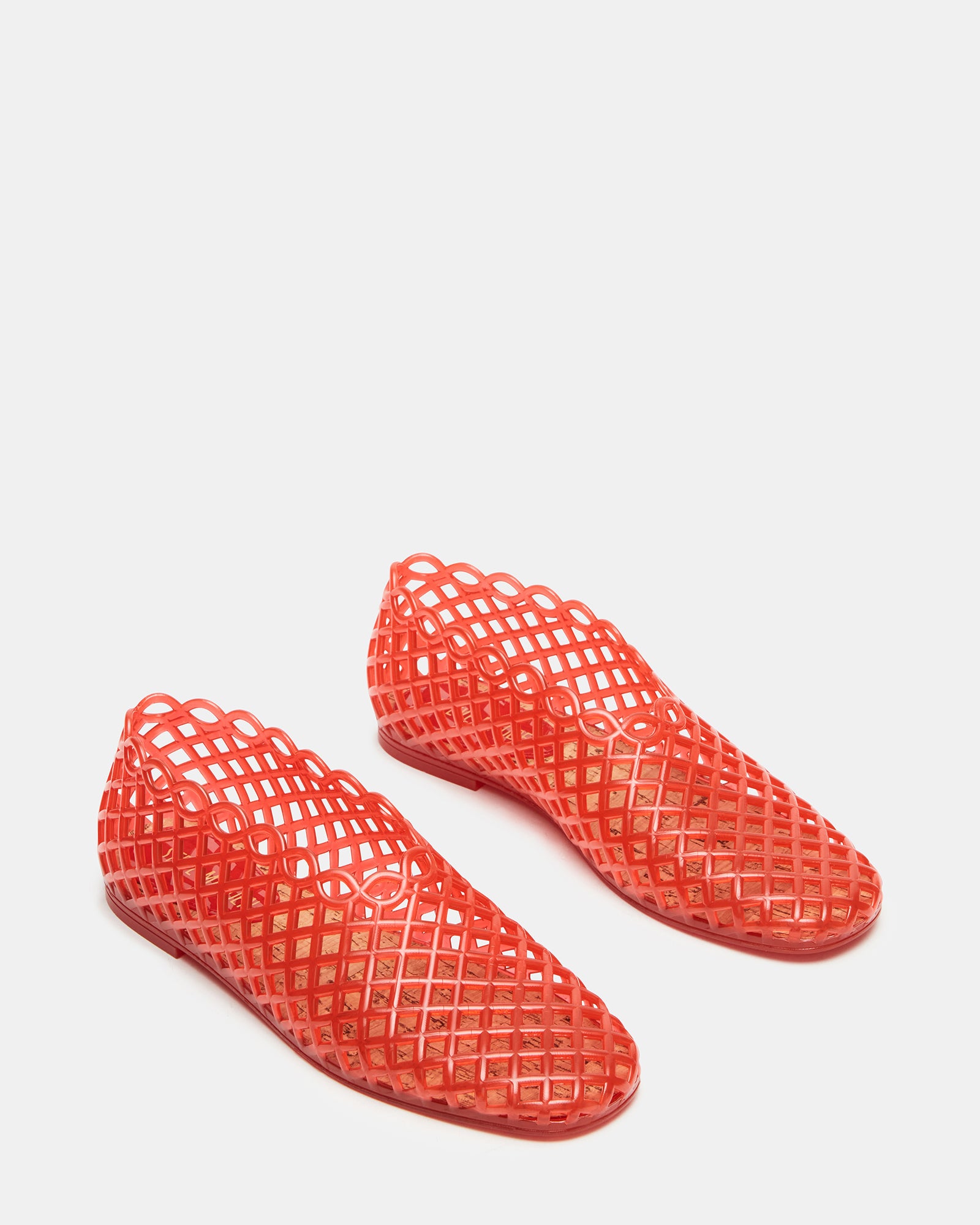 Styled shot of the Grove Red shoes paired with casual summer outfits