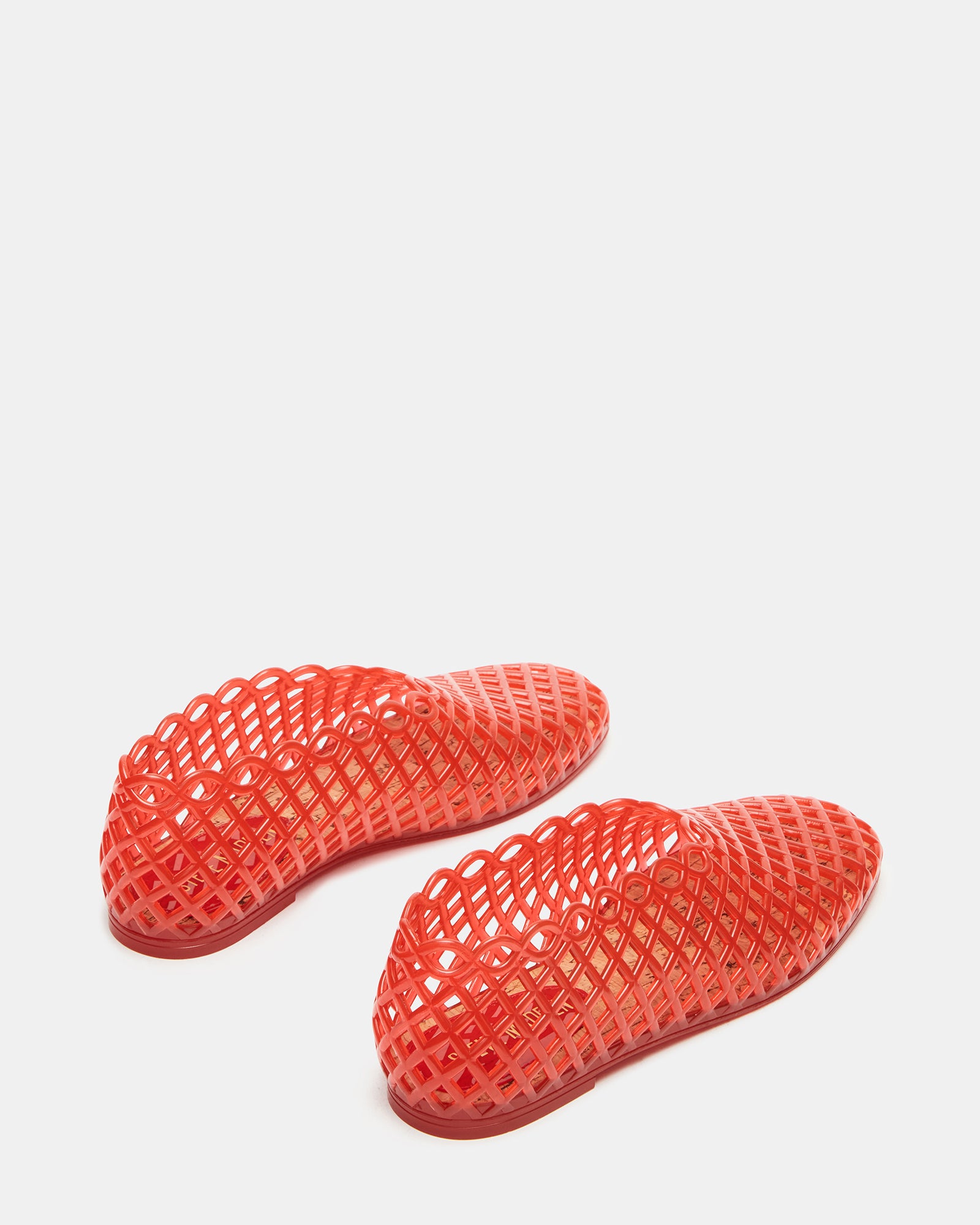 Styled shot of the Grove Red shoes paired with casual summer outfits