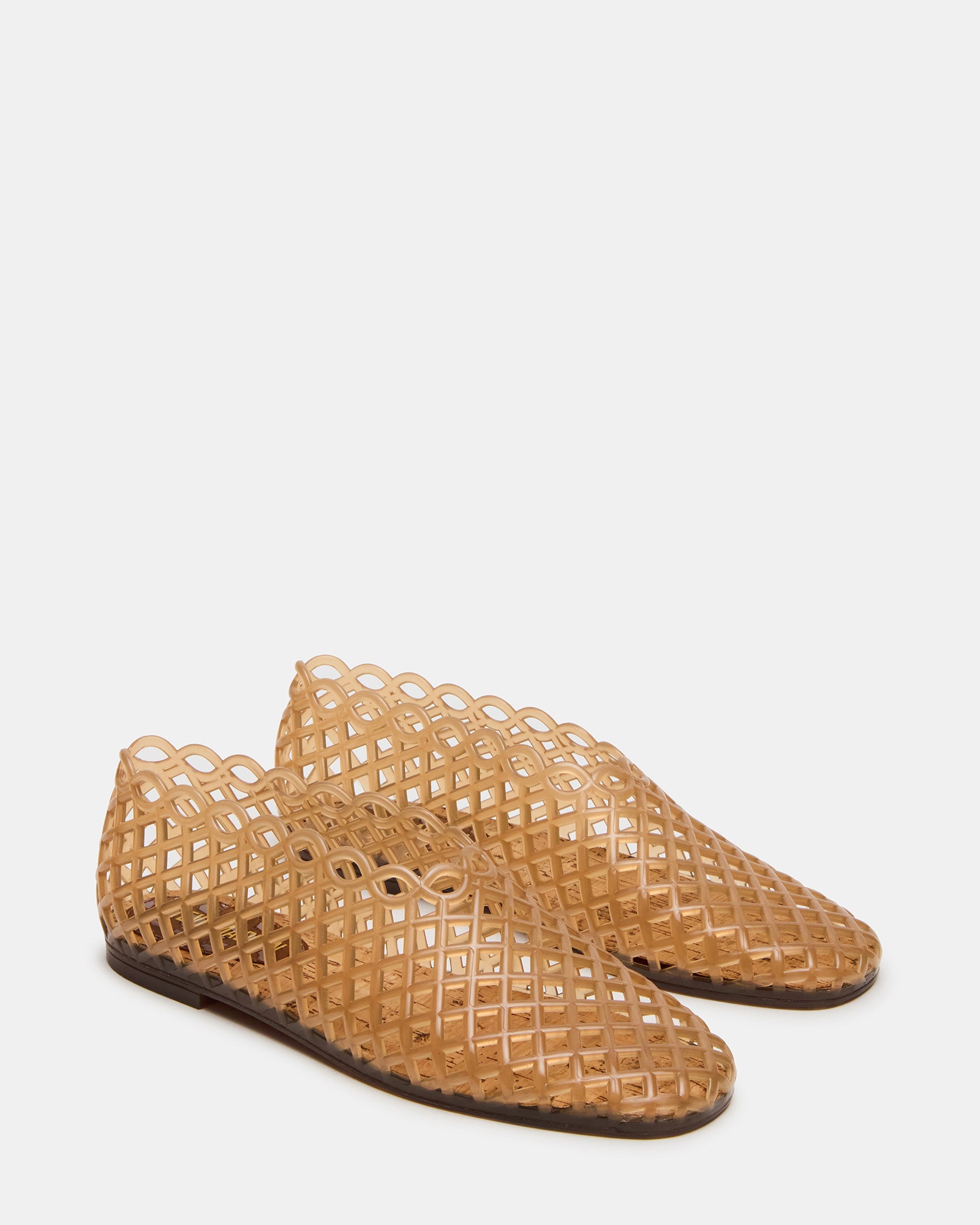 Close-up of synthetic upper and airy cage detail perfect for ladies flat comfort sandals