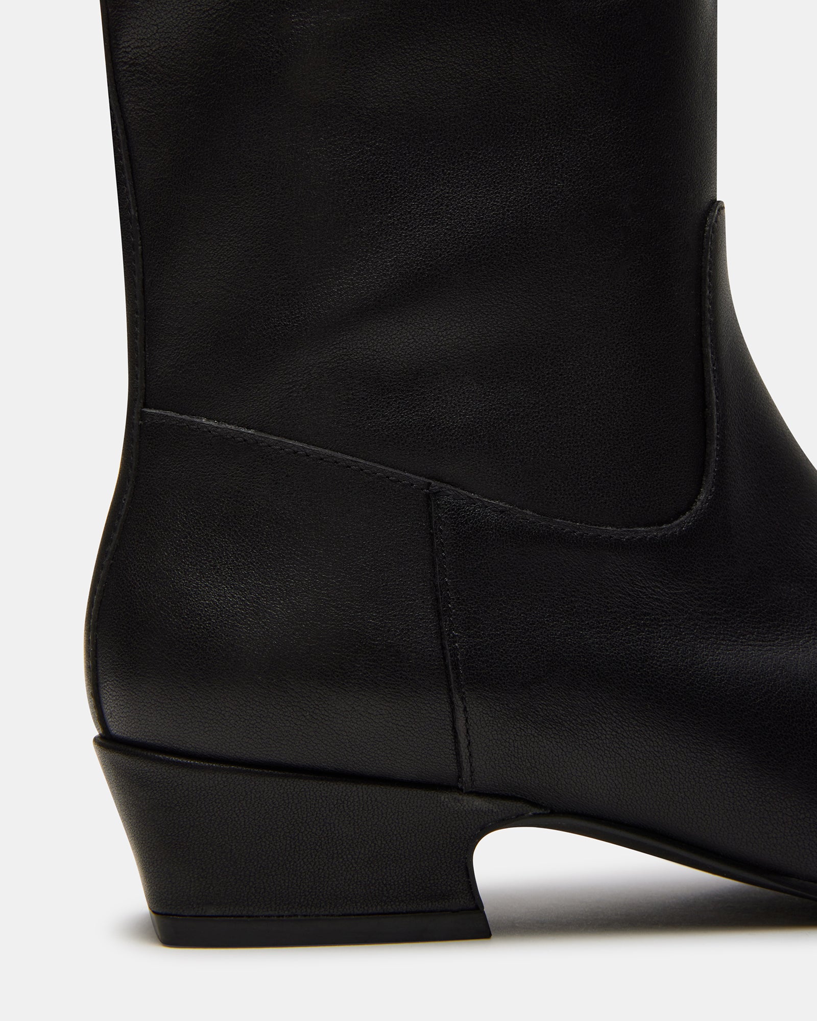 Gwyneth black leather boots showcasing the square toe design.