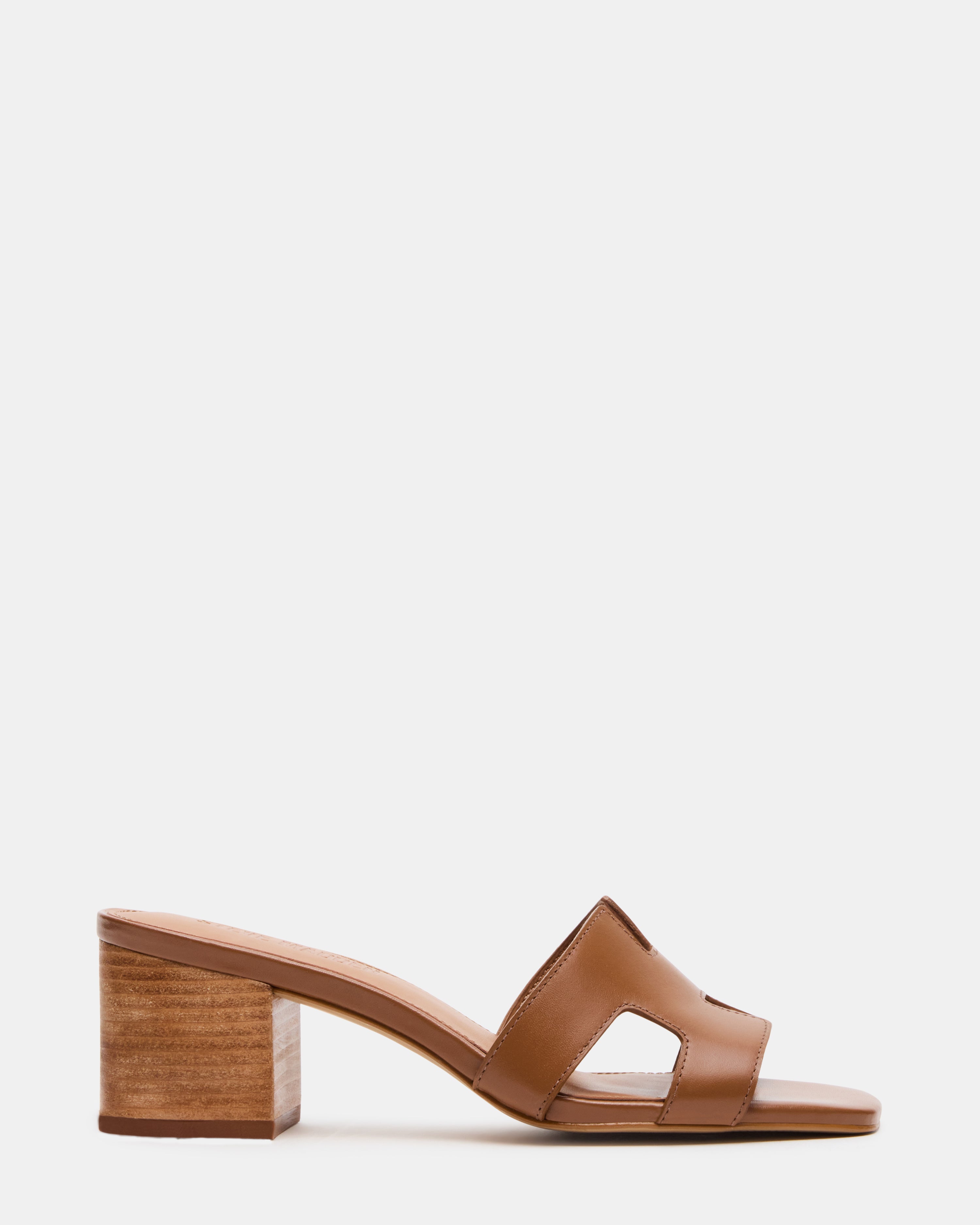 Front view of brown leather sandals highlighting square toe and block heel