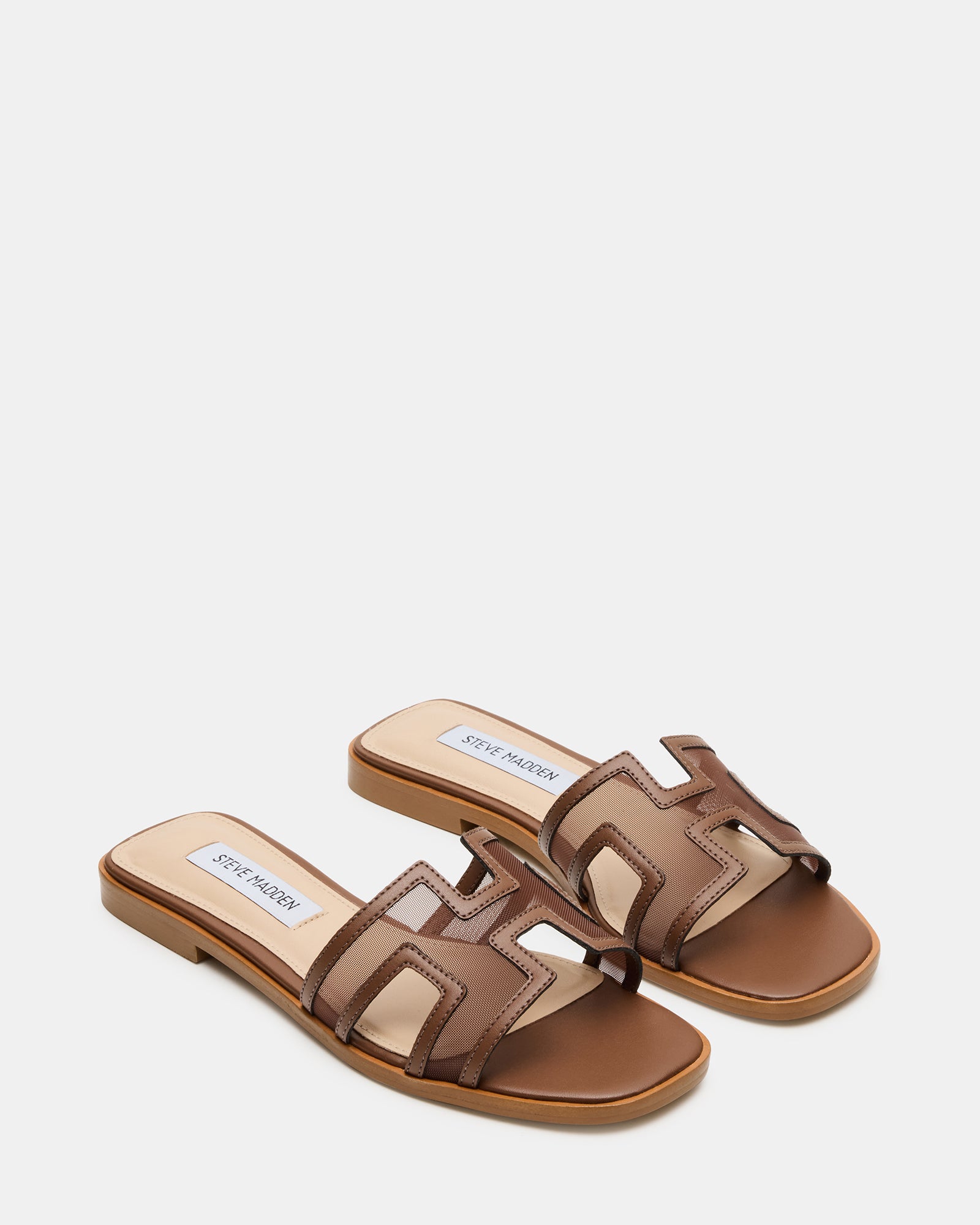 Side view of Haydn womens sandals highlighting the .75 inch heel