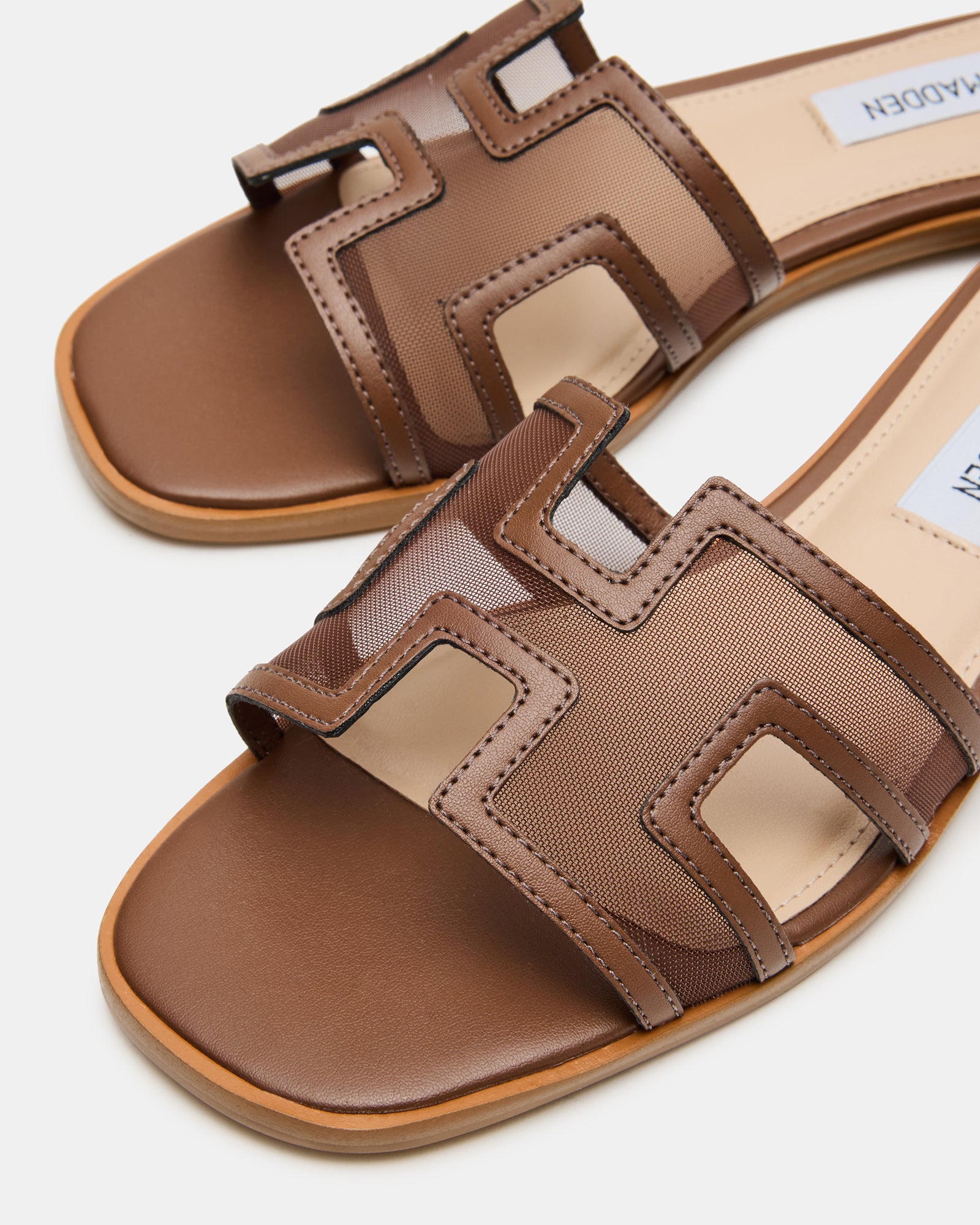 Haydn Comfort Slide Sandals in brown showing geometric cutouts