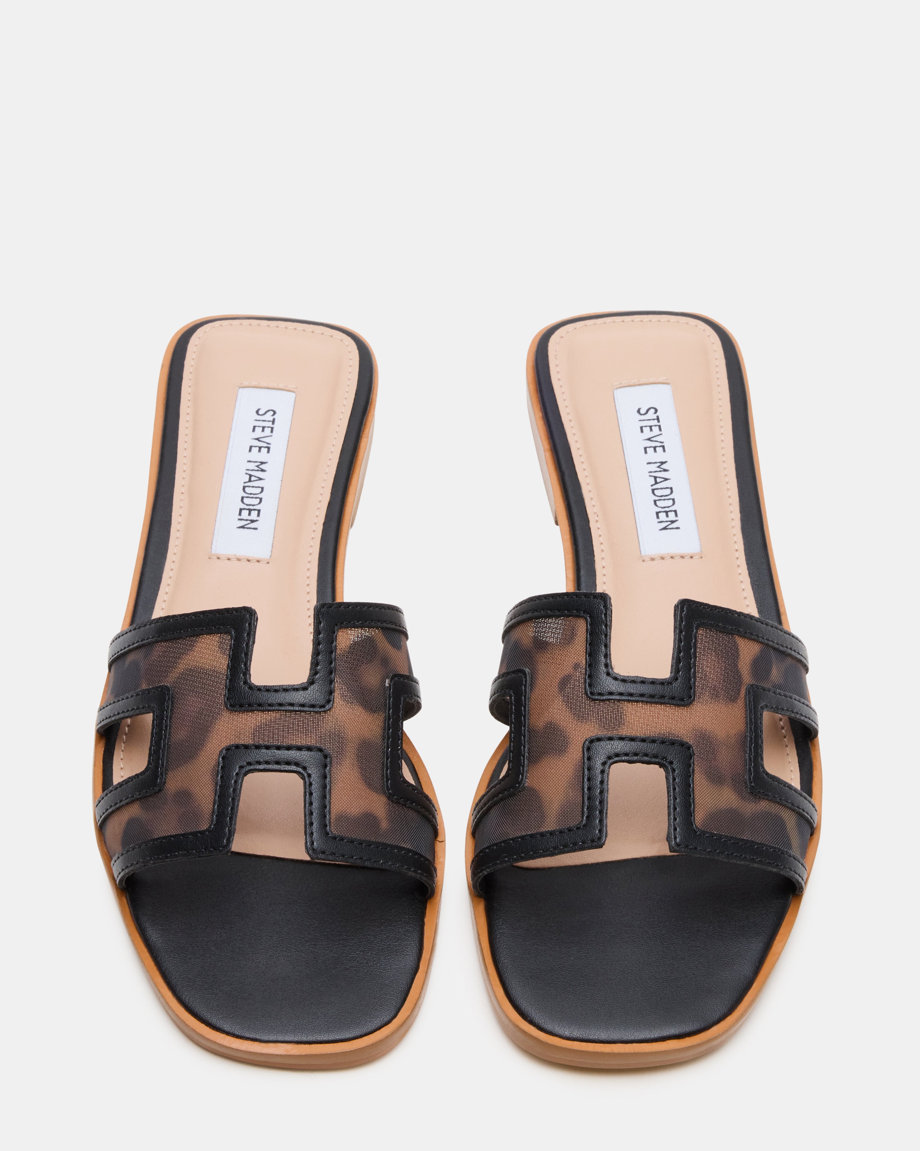 Top-down shot of the slip-on casual sandals on a models feet