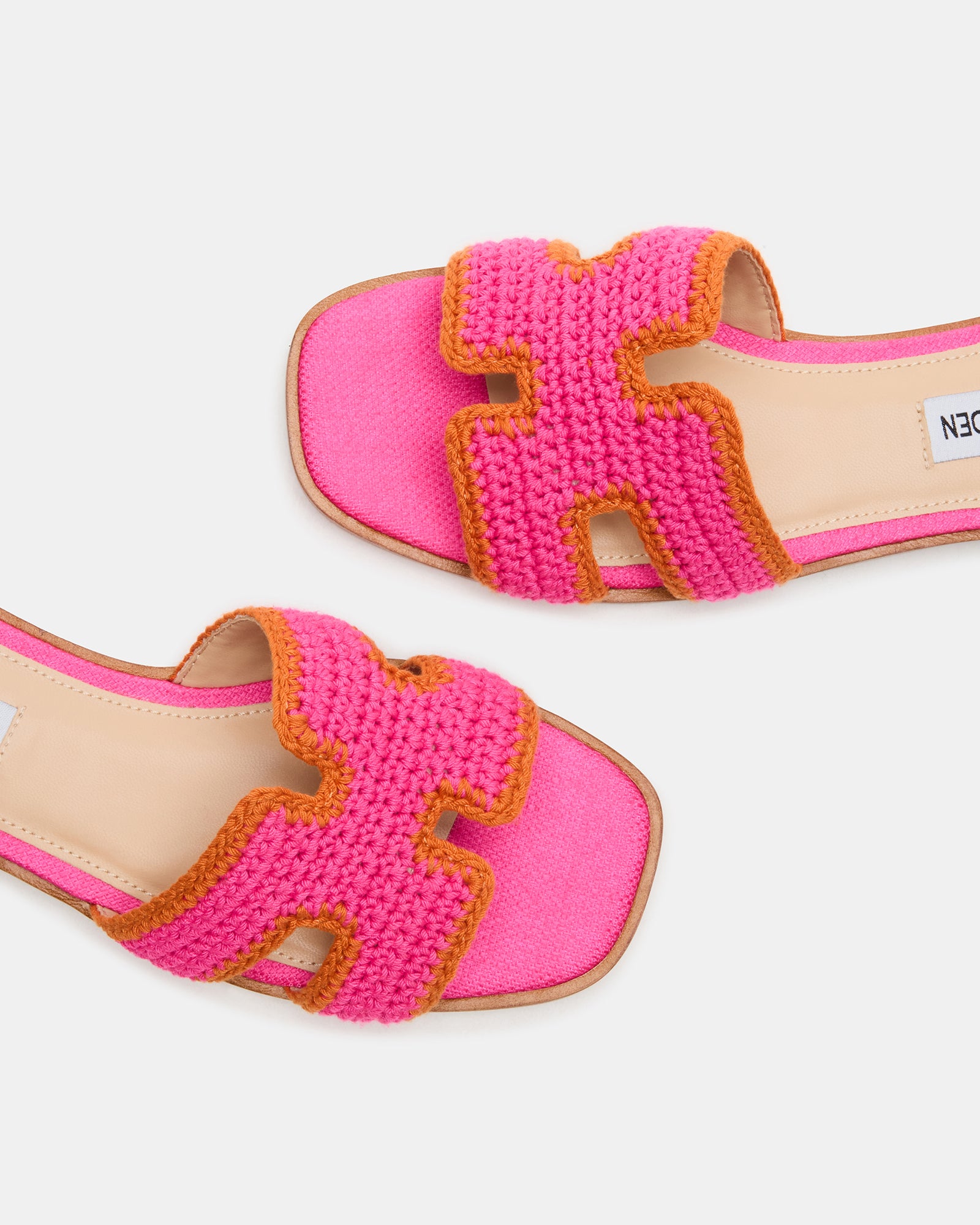 Close-up of Hadyn Pink Multi flat sandals showing geometric cutout details