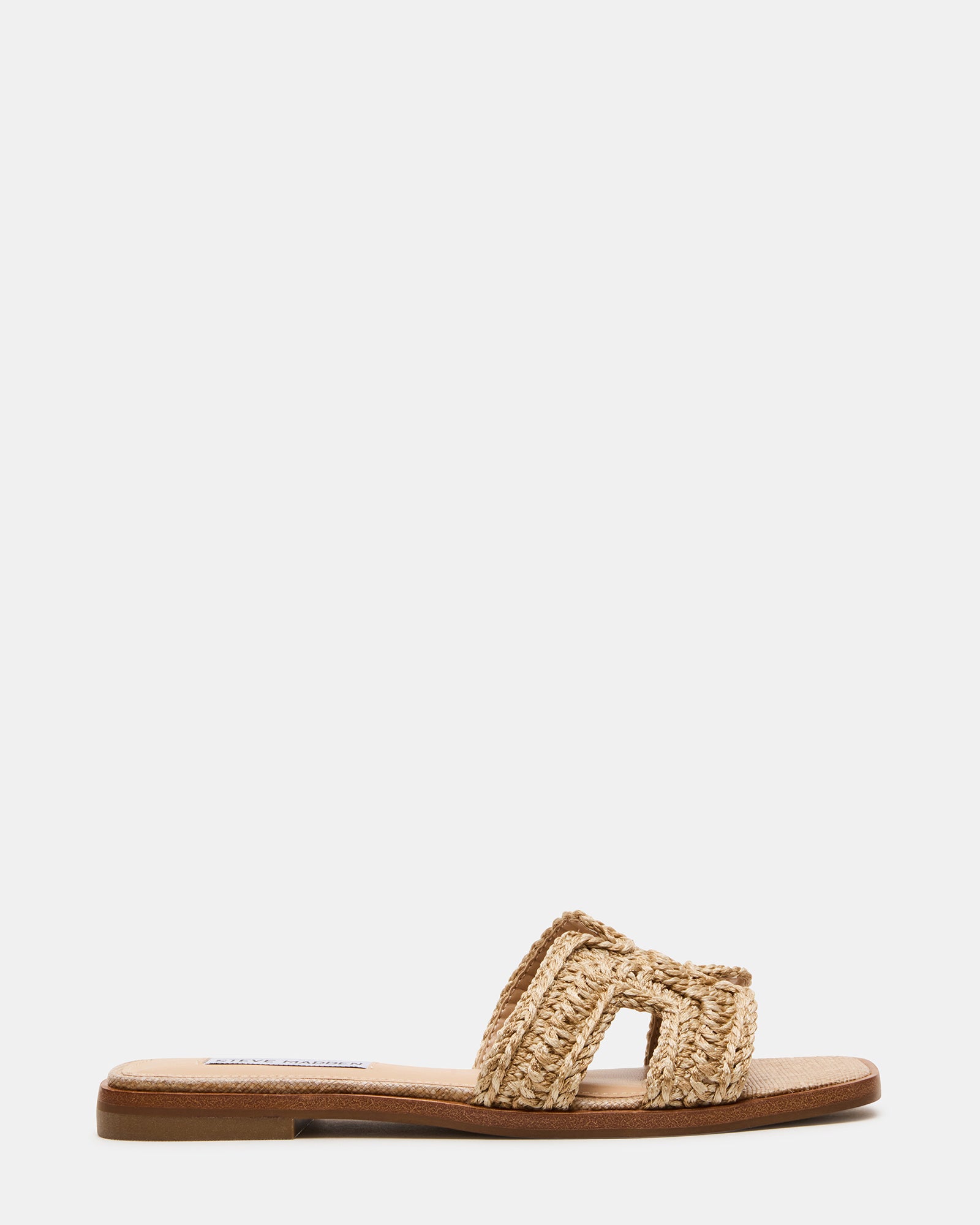 Hadyn slide sandals side view showcasing raffia texture and geometric cutouts