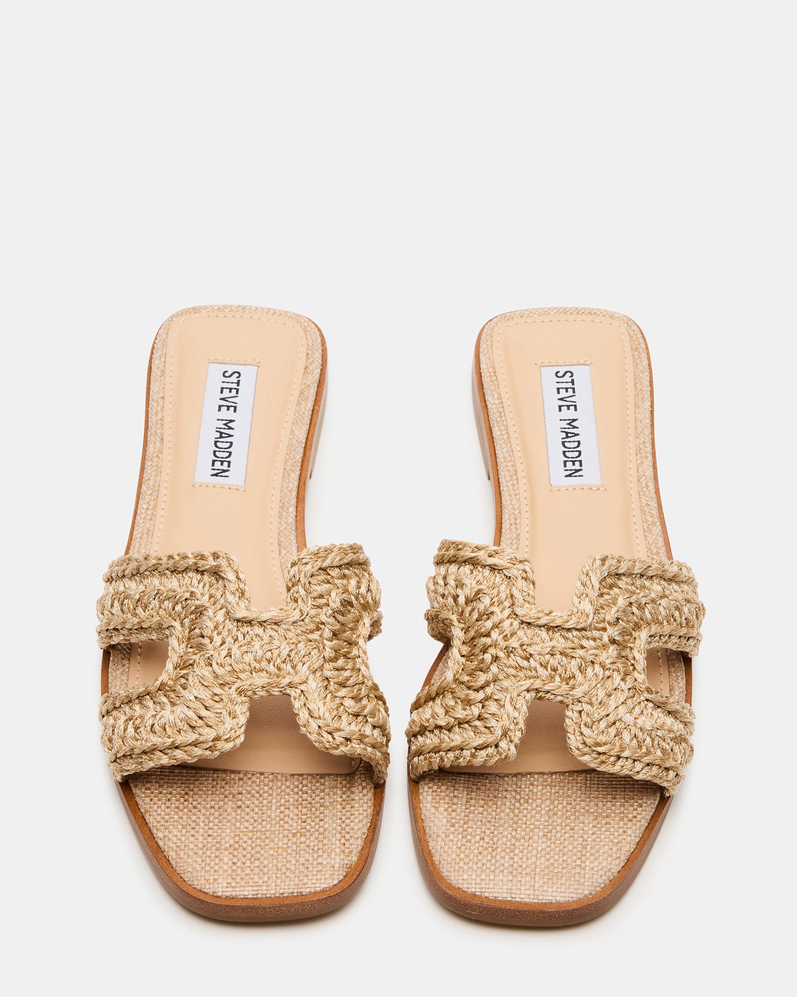 Close-up of crochet details on womens platform sandals
