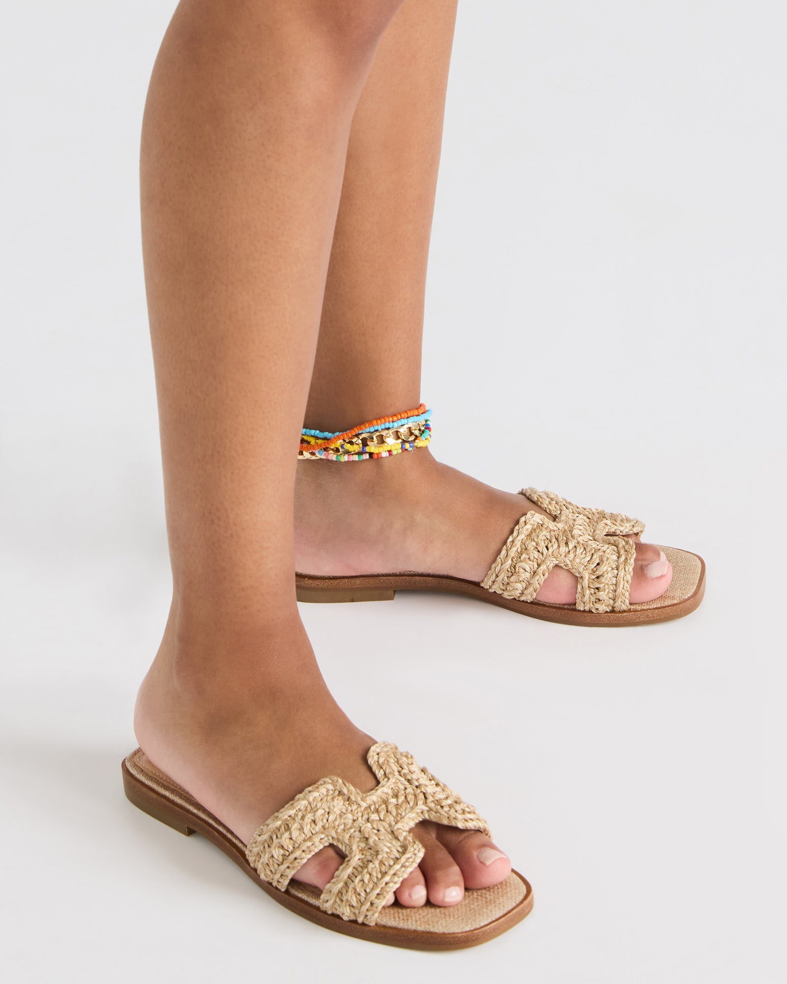 Close-up of crochet details on womens platform sandals