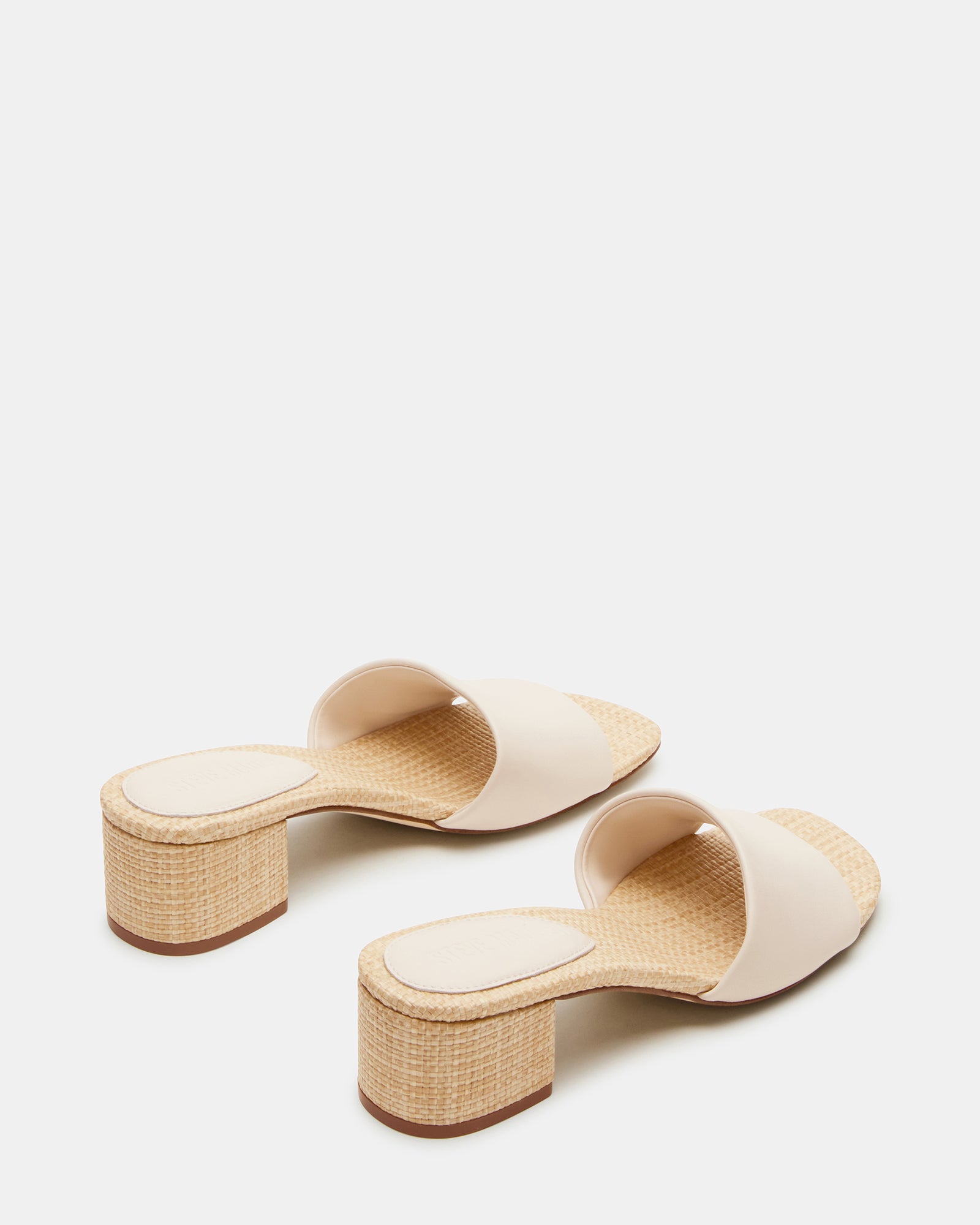 Side profile showcasing the 2-inch heel height of these brown leather sandals