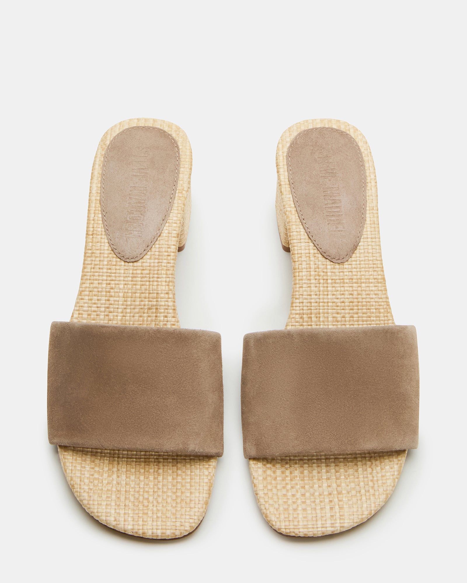 Side view of women’s taupe suede block heel mule sandals for stylish occasions