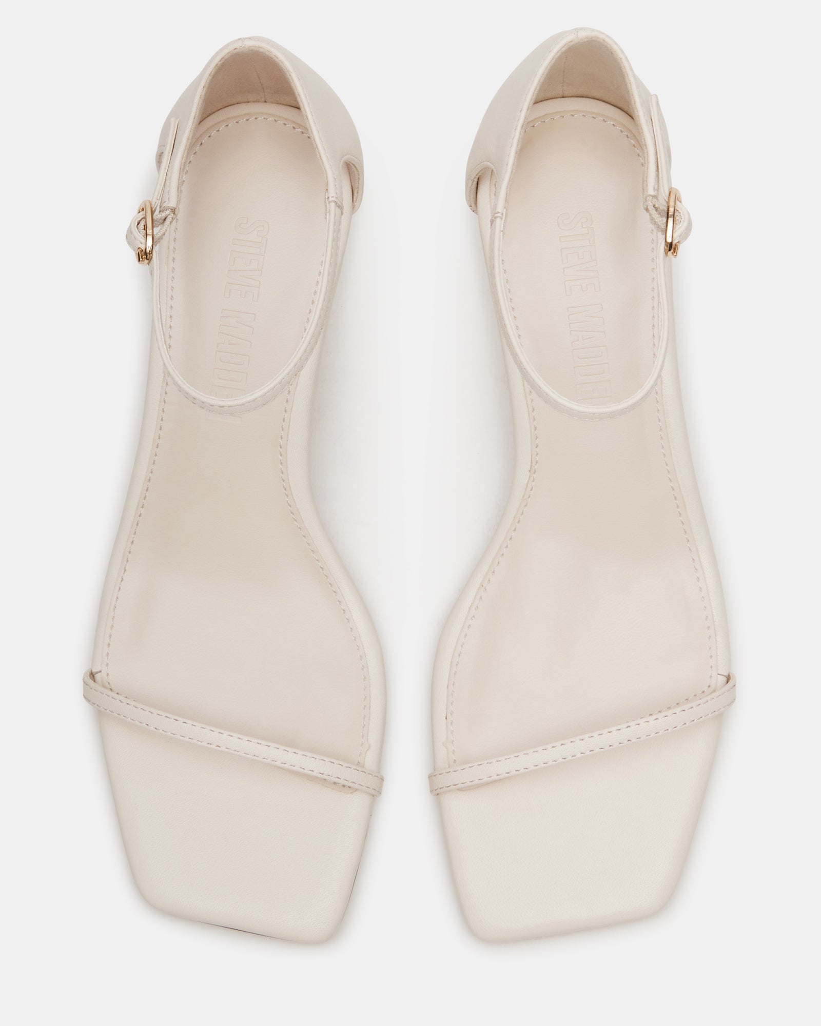 Side view of HAIZLEY Bone Leather kitten heels with ankle strap and square toe