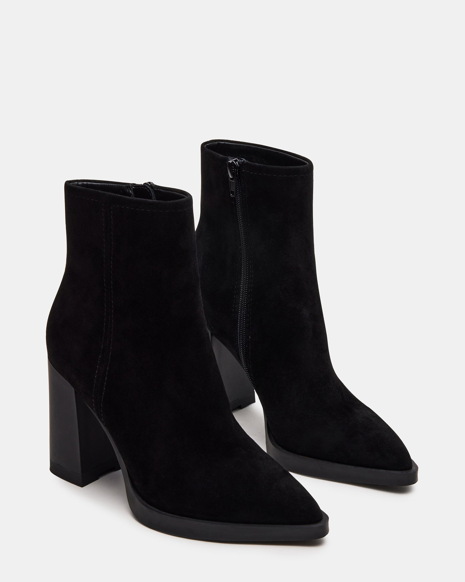Side view of block heel boots showing the structured silhouette.