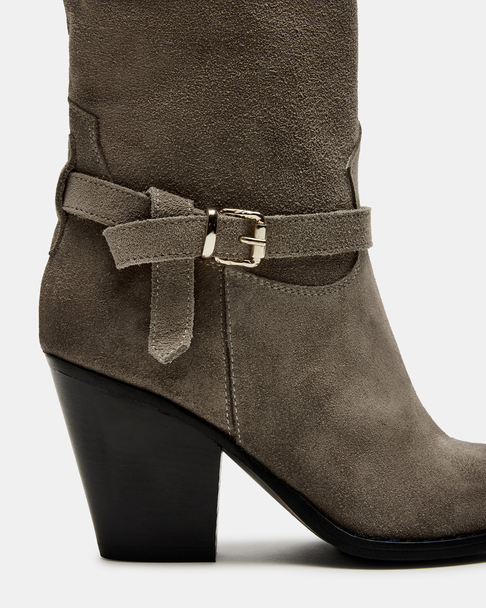 Outfit pairing: black suede booties with skinny jeans and a leather jacket.