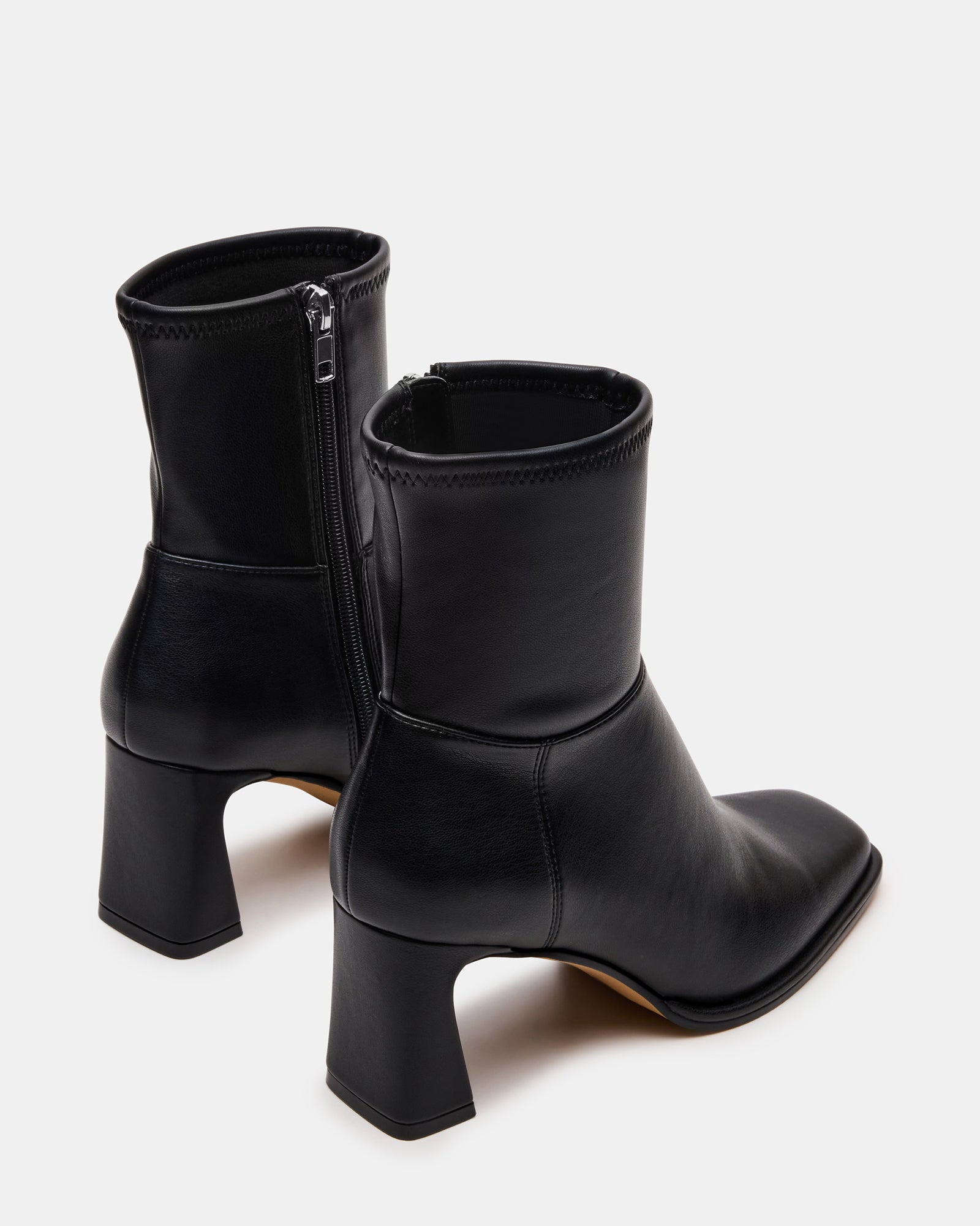 Side profile of stylish vegan leather ankle boots for daily wear