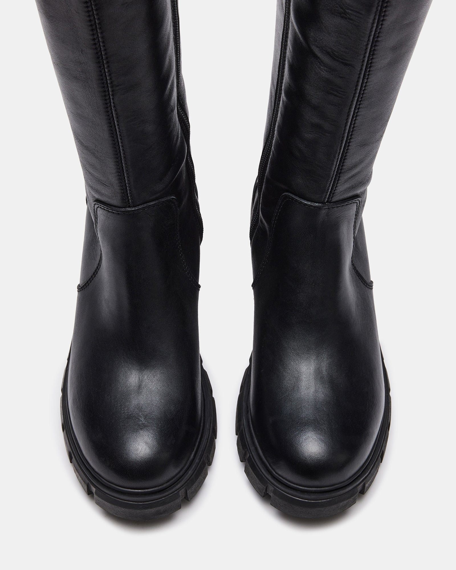 Black leather knee boots with chunky sole, side view