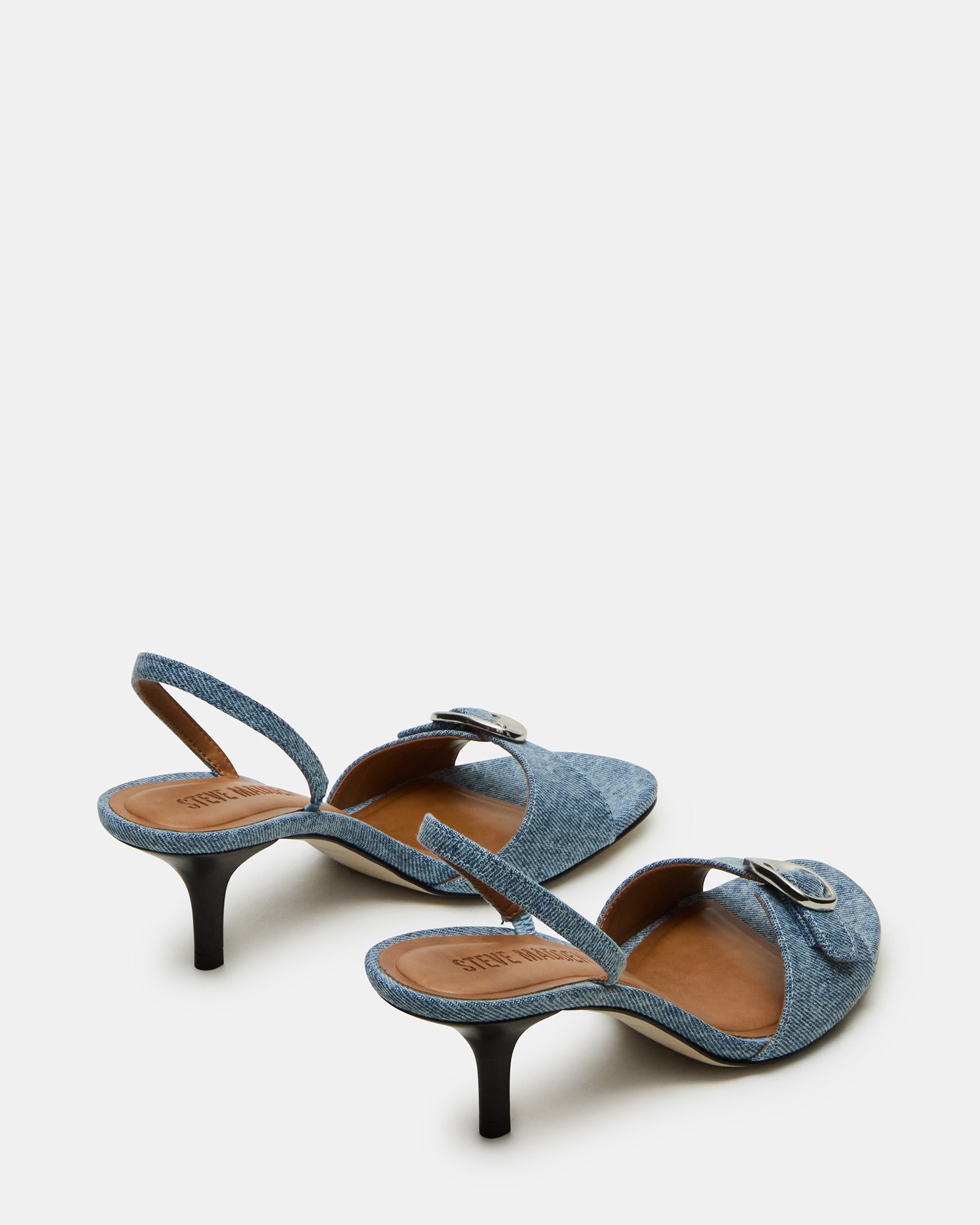 Side profile showing 3-inch heel and stylish slingback strap for office-to-evening transitions.