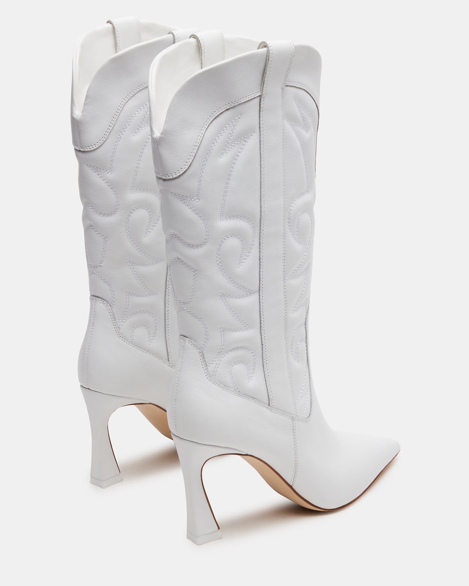 Side view of womens white leather pointed toe western boots with heel