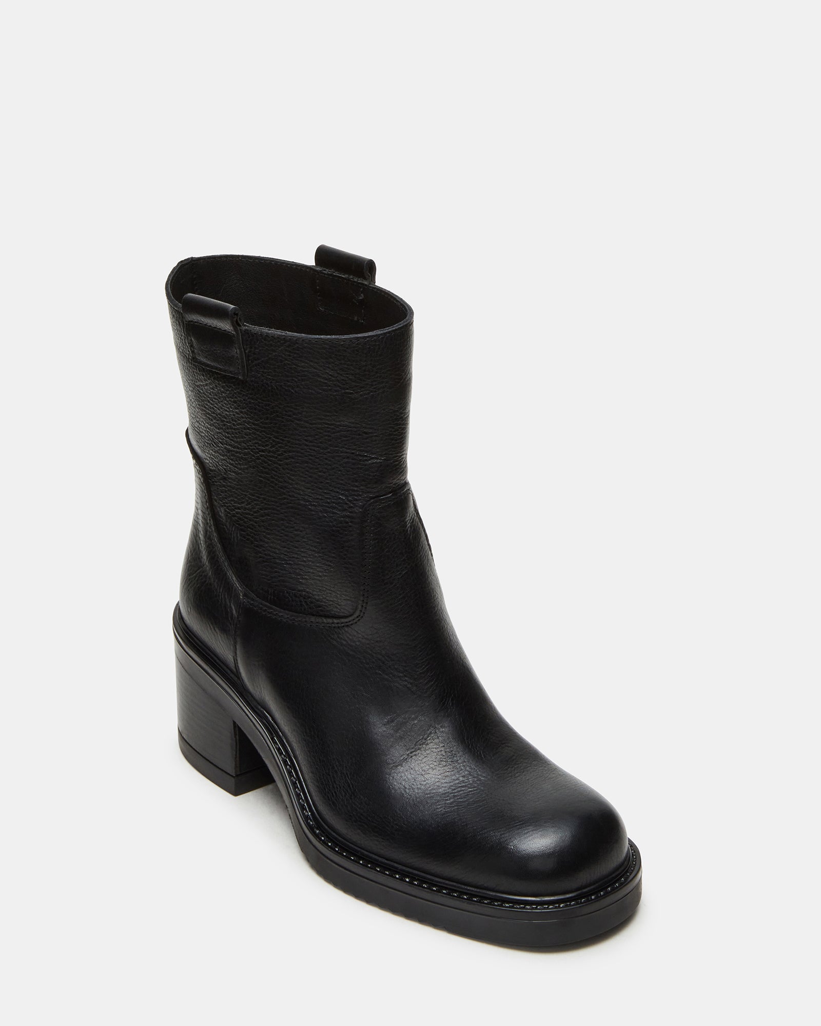Street-style shot of boots leather ankle worn with jeans in Brooklyn
