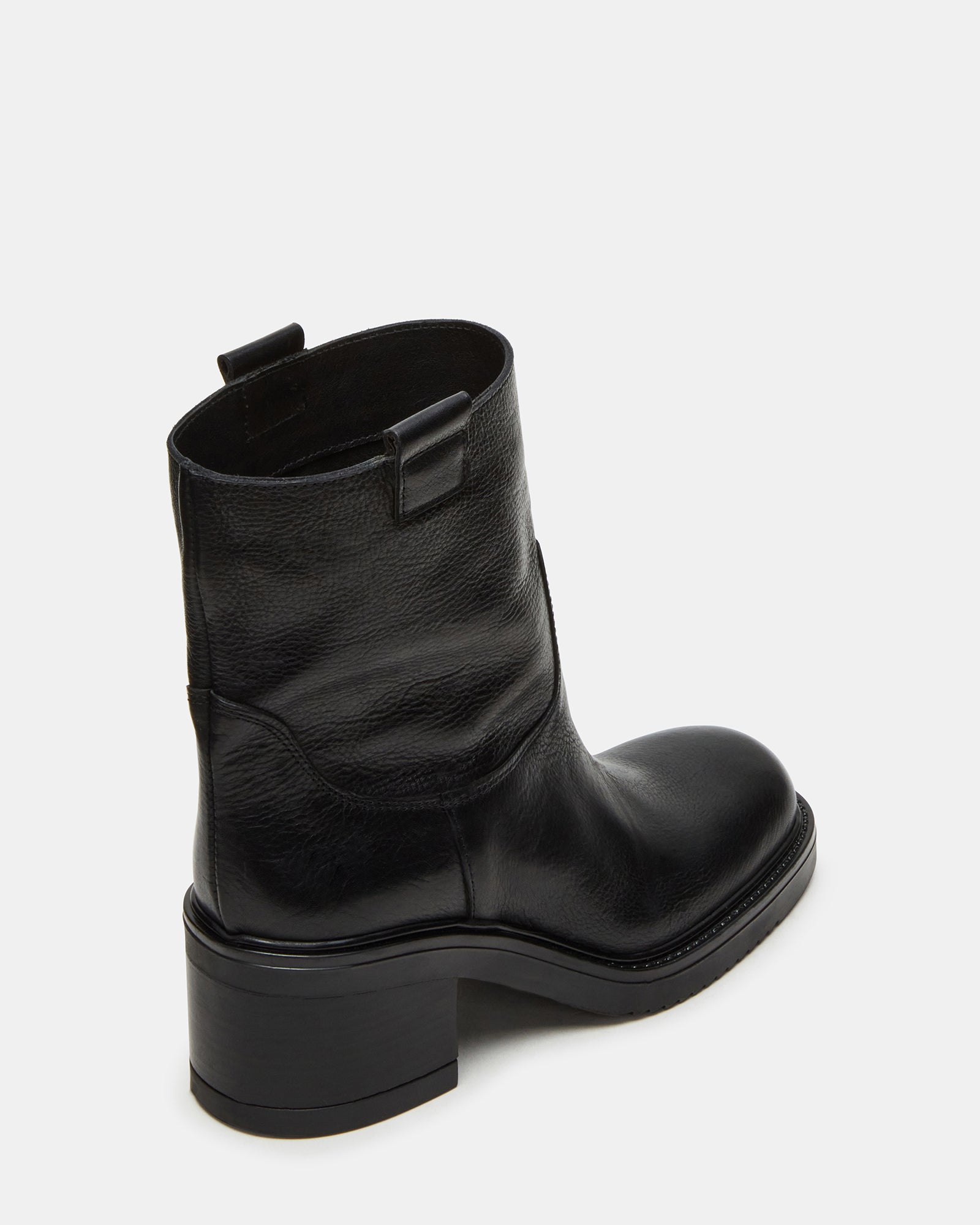 Street-style shot of boots leather ankle worn with jeans in Brooklyn