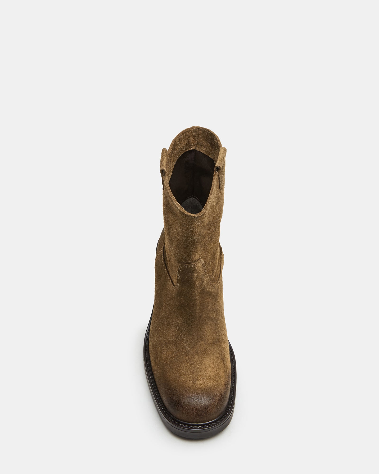 Front angle of suede booties styled with autumn denim look