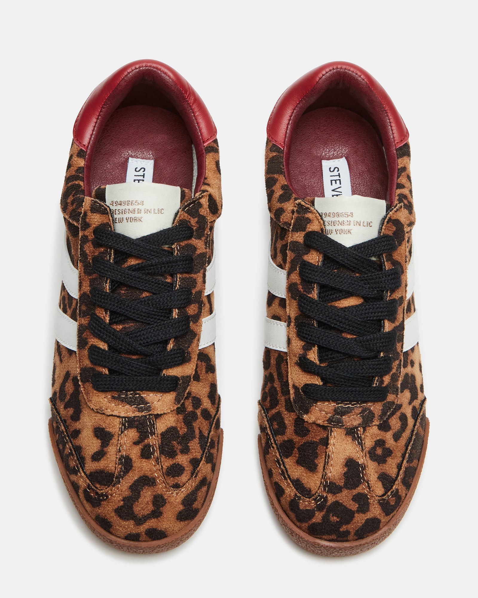 Close-up of HUDSIN Leopard sneaker stitching and leather texture
