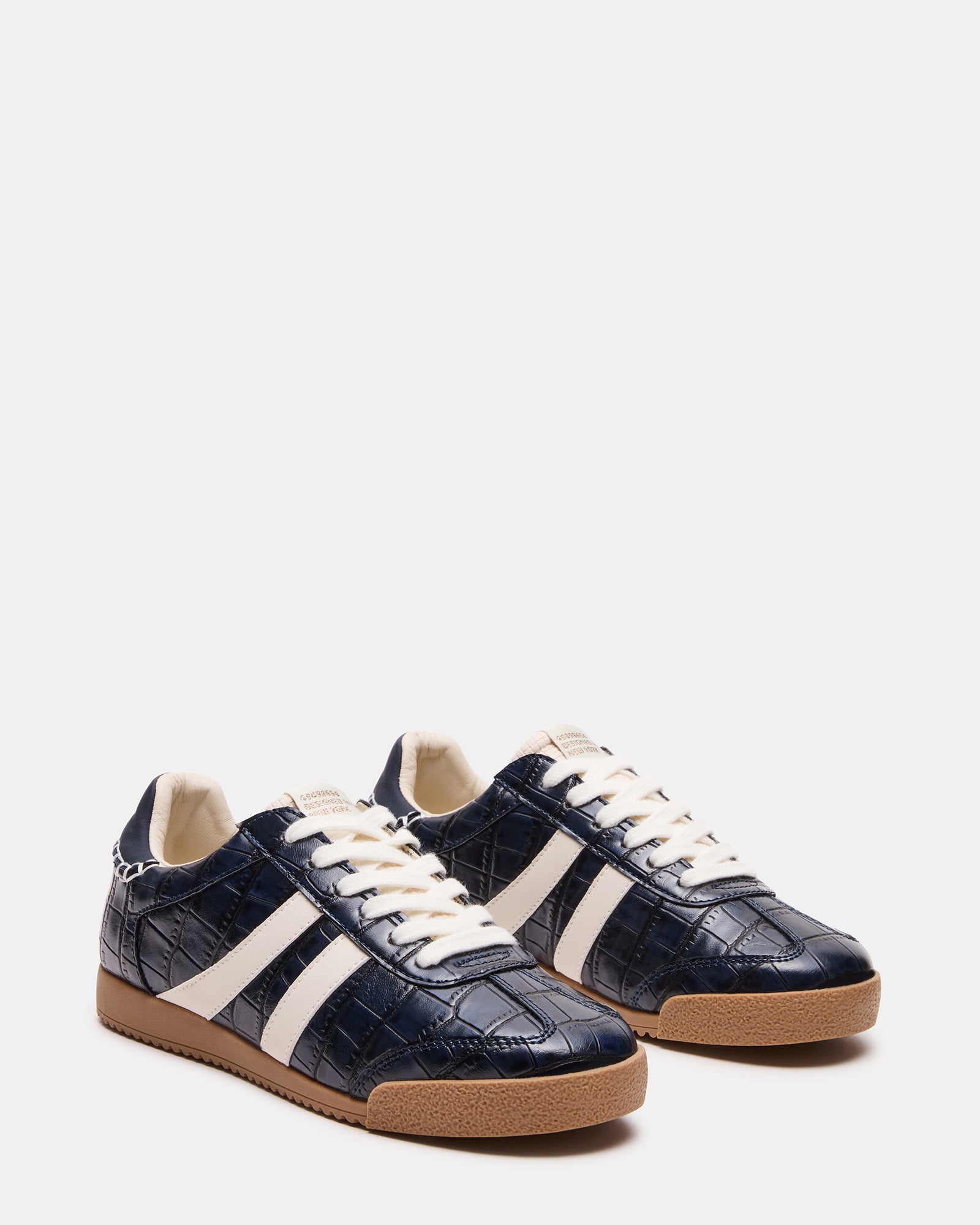 Styled pair of HUDSIN sneakers perfect for casual and dressier outfits